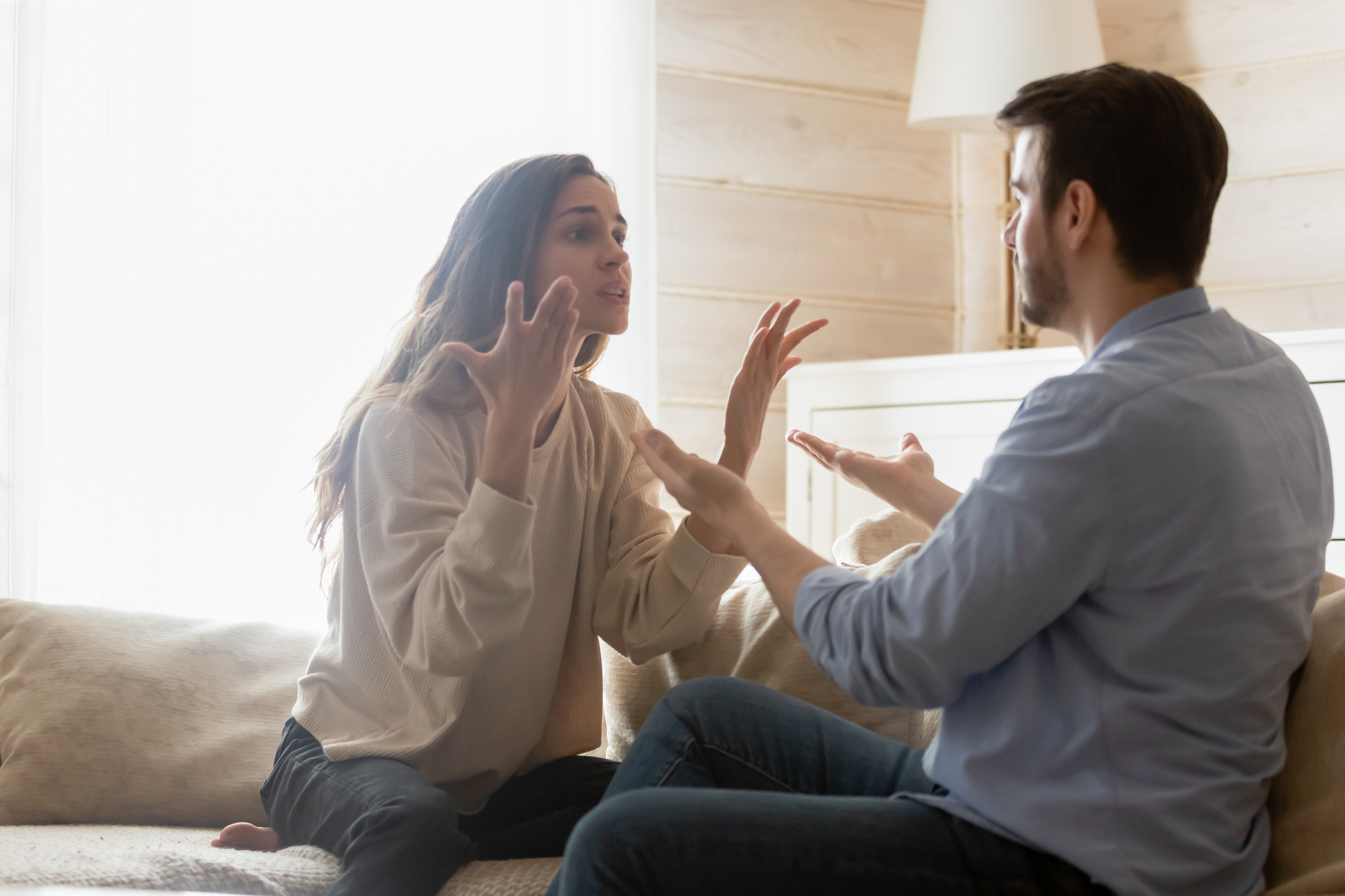A couple arguing at home | Source: Shutterstock