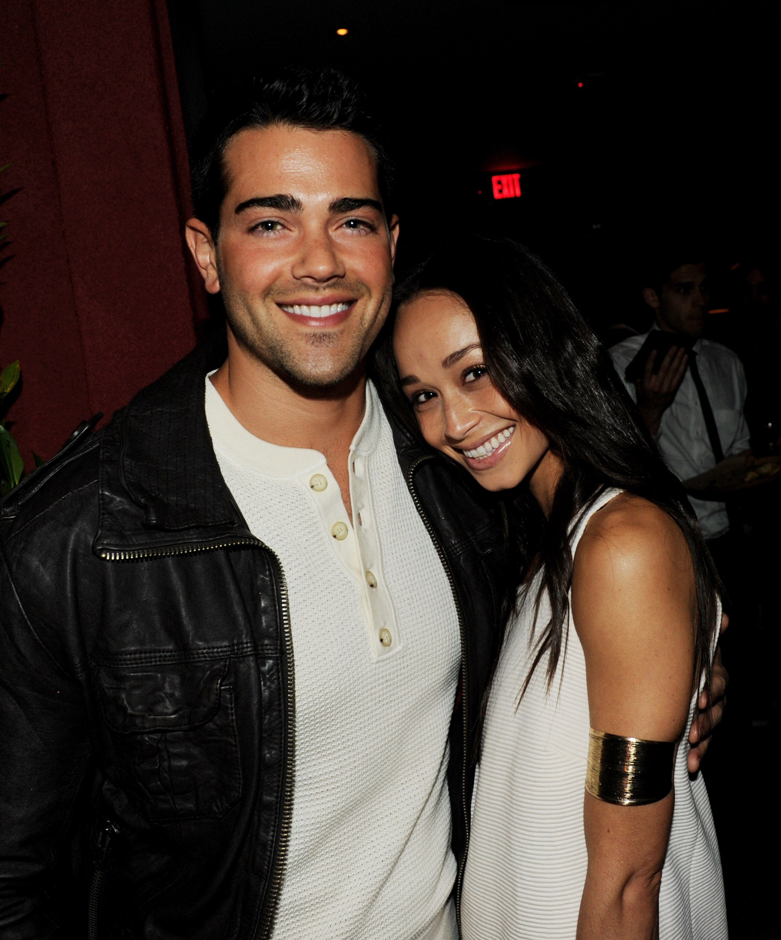 Jesse Metcalfe and Cara Santana pose at the after party for the premiere of The Weinstein Company's "Scream 4" Presented by AXE Shower at The Redbury Hotel on April 11, 2011, in Los Angeles, California | Source: Getty Images