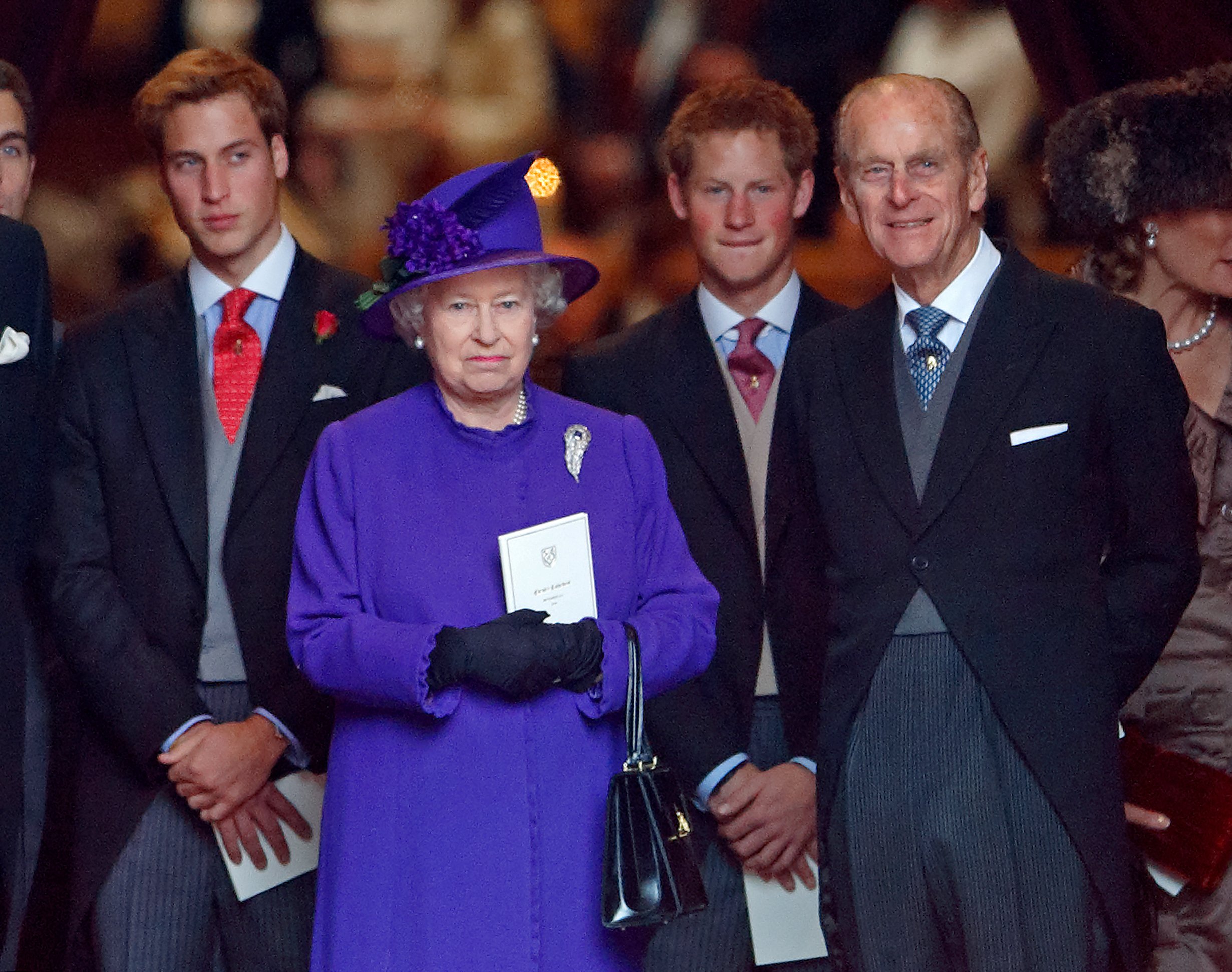 Prince William, Queen Elizabeth II, Prince Harry and Prince Philip, Duke of Edinburgh attend the wedding of Edward van Cutsem and Lady Tamara Grosvenor on November 6, 2004 in Chester, England. | Source: Getty Images 