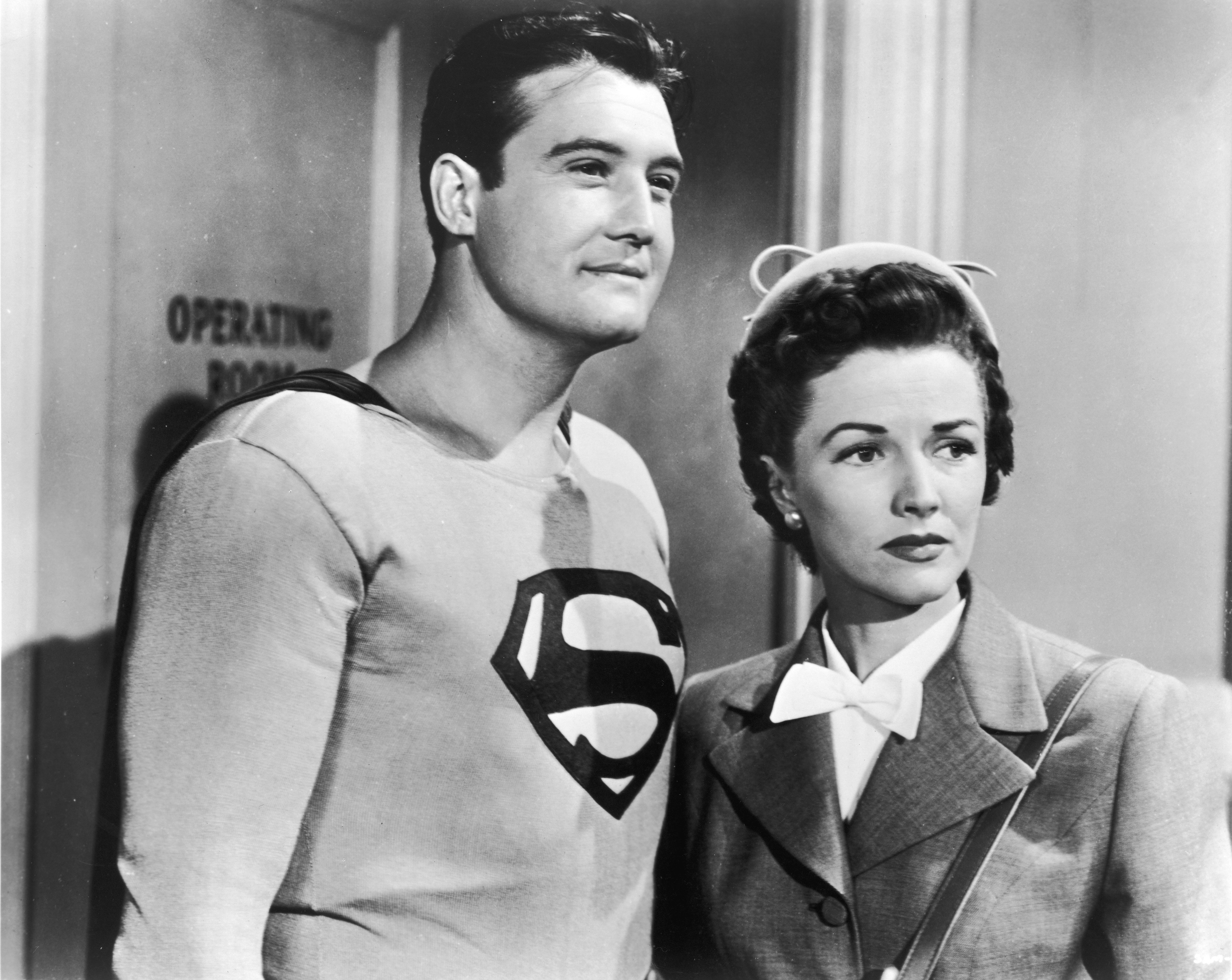 American actor George Reeves (1914 - 1959), as Superman, stands with Phyllis Coates, as Lois Lane, in a still from the television series, 'Adventures of Superman,' circa 1952. | Source: Getty Images