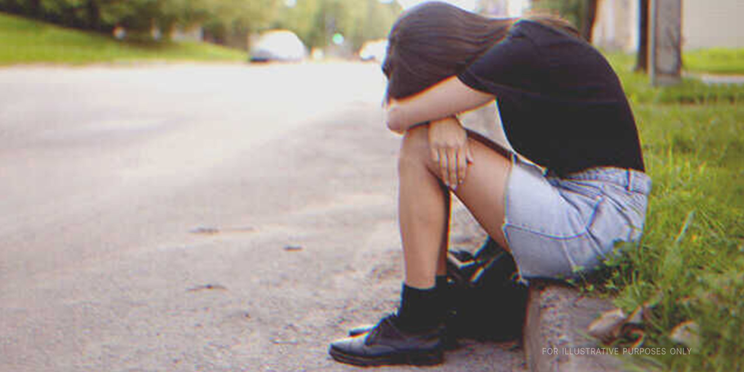 Girl Crying On The Side Of The Road. | Source: Shutterstock