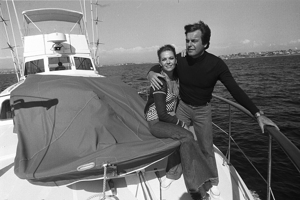 Natalie Wood and Robert Wagner on their bought in 1976 | Source: Getty Images