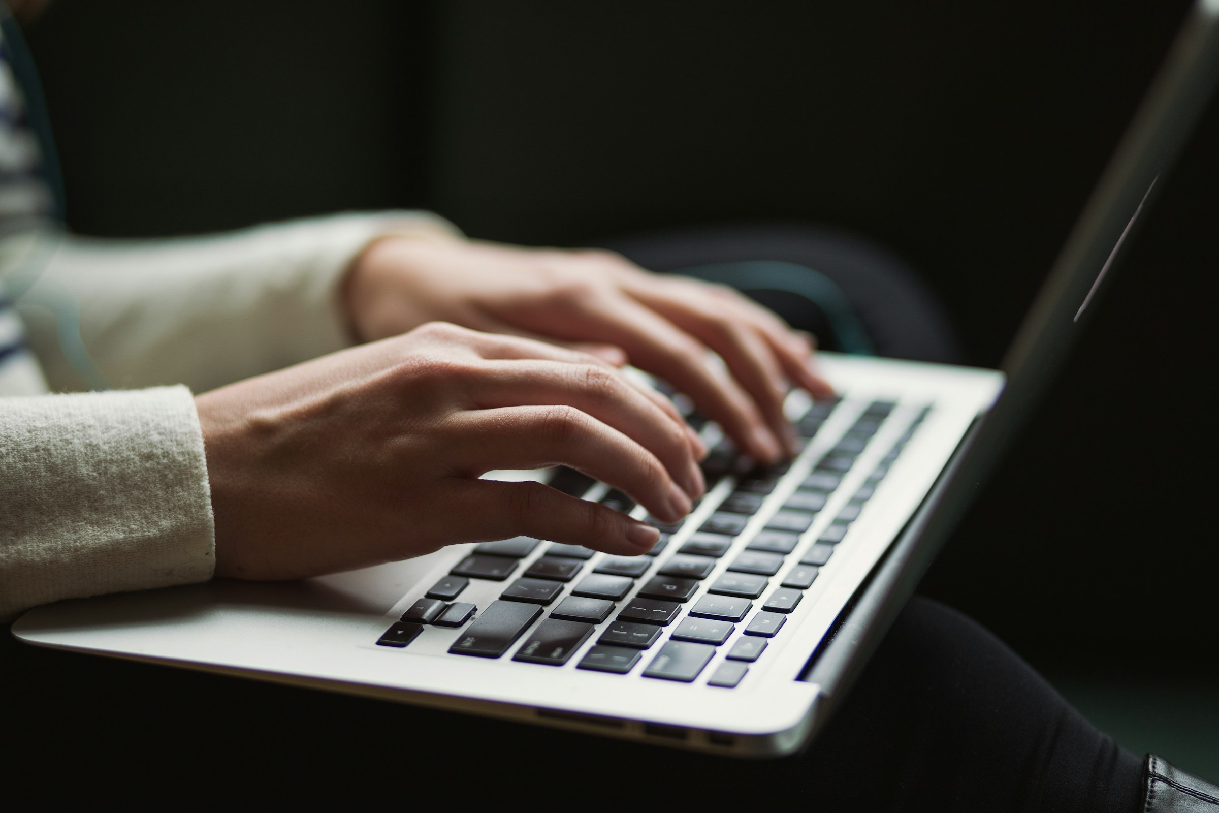 A person typing on a laptop | Source: Unsplash