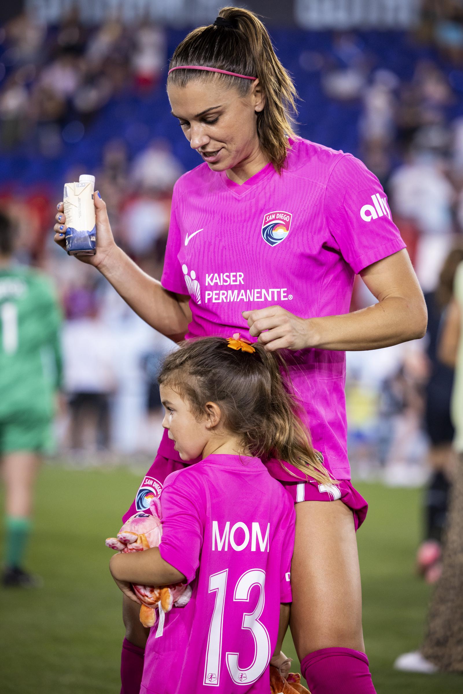 Alex Morgan and Charlie after the National Women's Soccer League match against the NJ/NY Gotham FC at Red Bull Arena in Harrison, New Jersey, on June 19, 2024. | Source: Getty Images