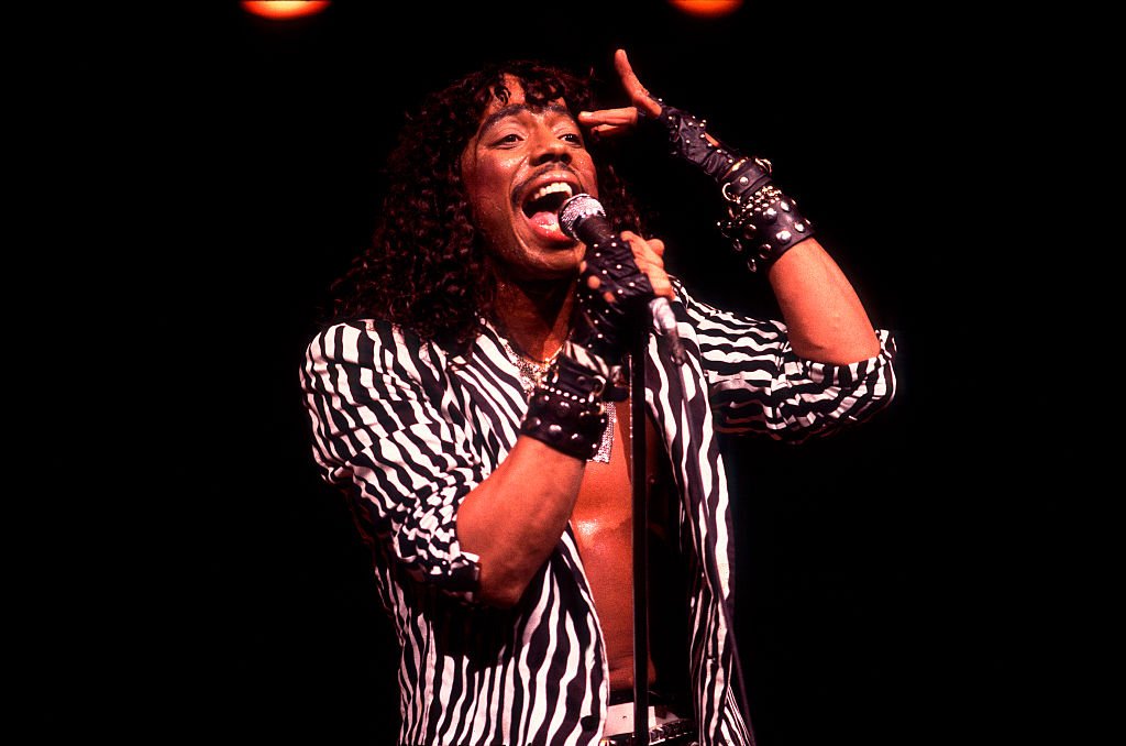 Rick James (born James Johnson Jr, 1948 - 2004) performs onstage at the Holiday Star Theater, Merrillville, Indiana, September 9, 1983 | Photo: Getty Images