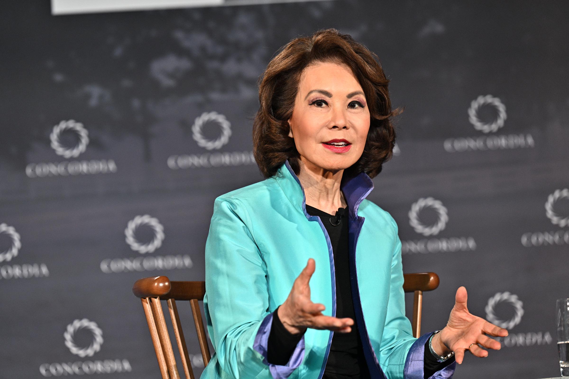 Elaine Chao speaks during a public appearance, as questions later emerged about her decision to continue a trip to China while her husband, Mitch McConnell, remained hospitalized in the United States. | Source: Getty Images