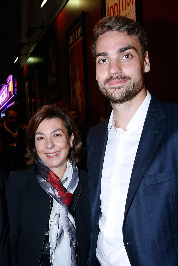 Fils d'Yves Montand, Valentin Livi et sa mère Carole Amiel assistent à l'événement "Ivo Livi ou le destin d'Yves Montand" le 11 Octobre 2016. | Photo : Getty Images