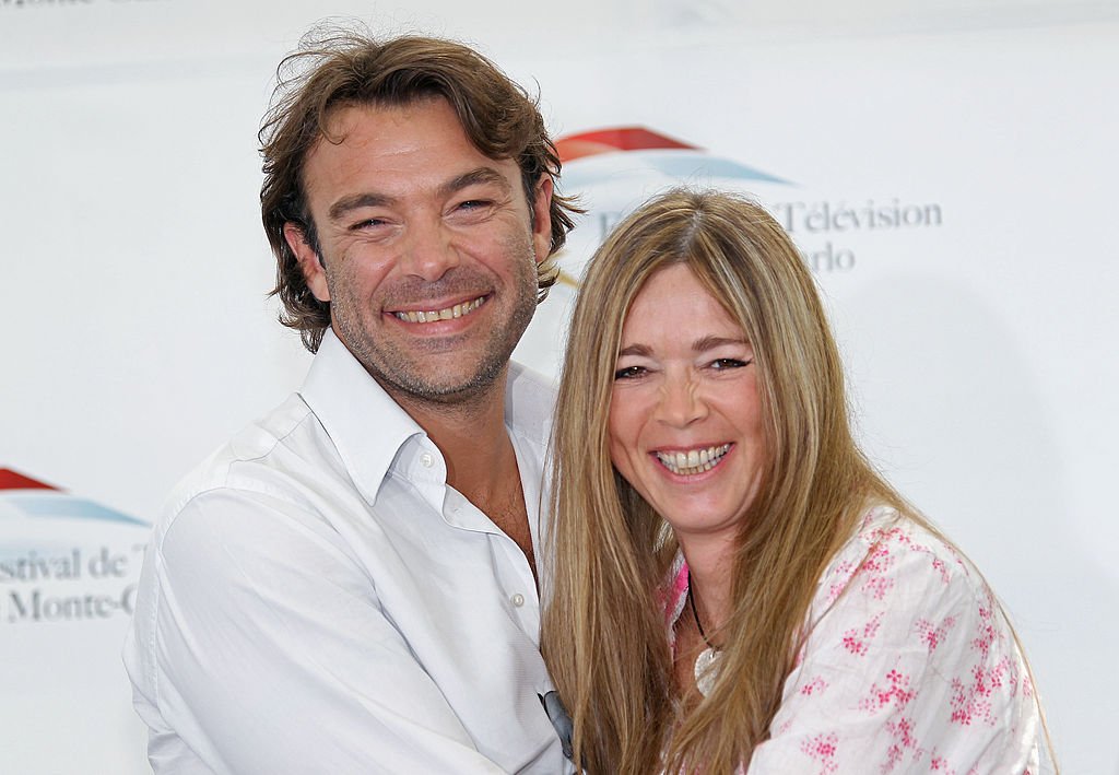 French actress Patrick Puydebat and French actress Hélène Rolles pose during a photo call to the show 
