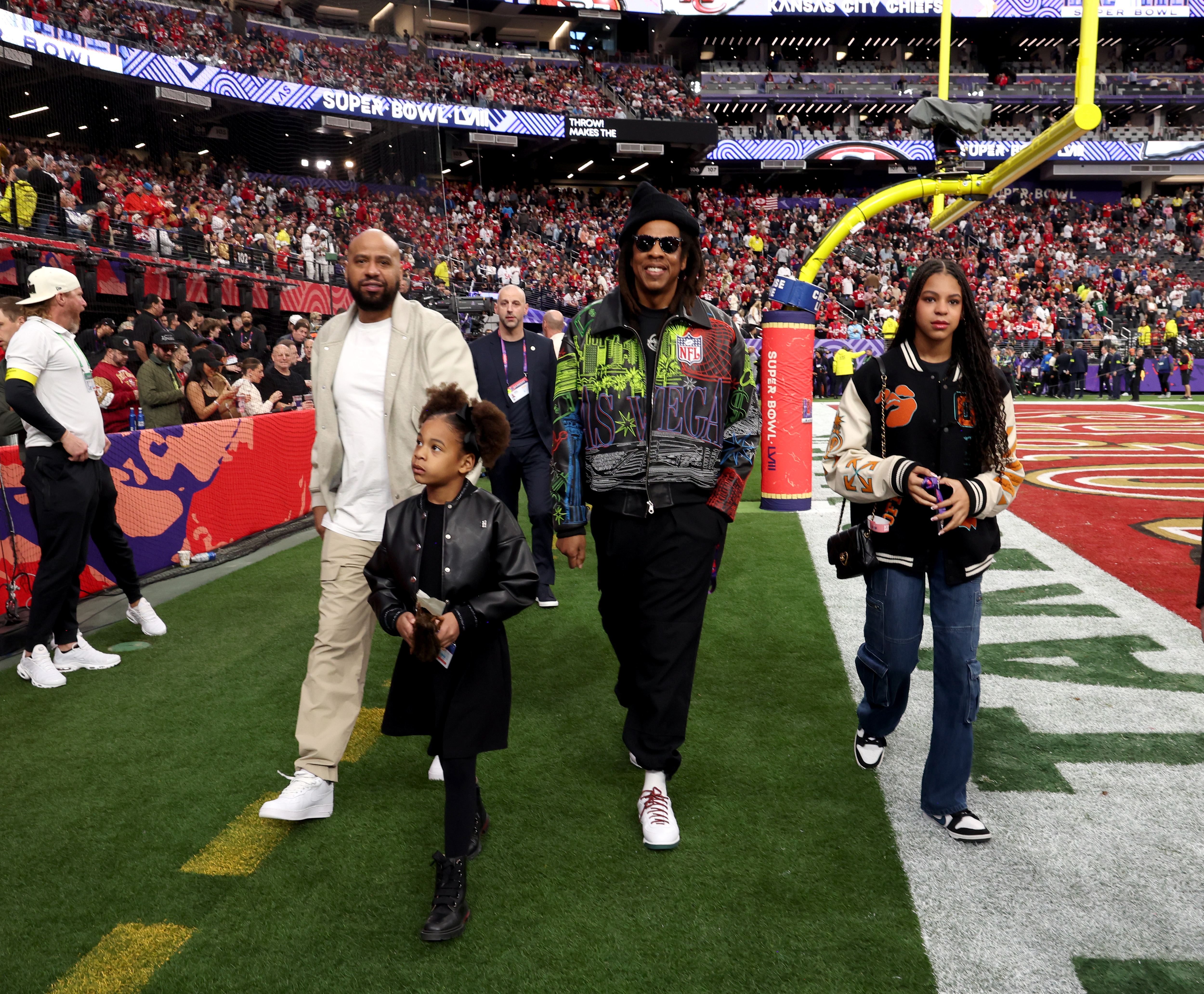 Rumi, Jay-Z and Blue Ivy Carter at the Super Bowl LVIII Pregame in Las Vegas, Nevada on February 11, 2024 | Source: Getty Images