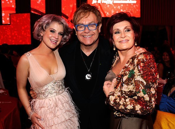 Kelly Osbourne, Musician Sir Elton John and Sharon Osbourne at the 18th Annual Elton John AIDS Foundation Academy Award Party on March 7, 2010 | Photo: Getty Images