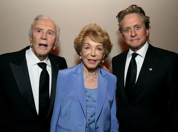 Kirk Douglas, Anne Buydens and Michael Douglas on February 22, 2009 in West Hollywood, California | Photo: Getty Images