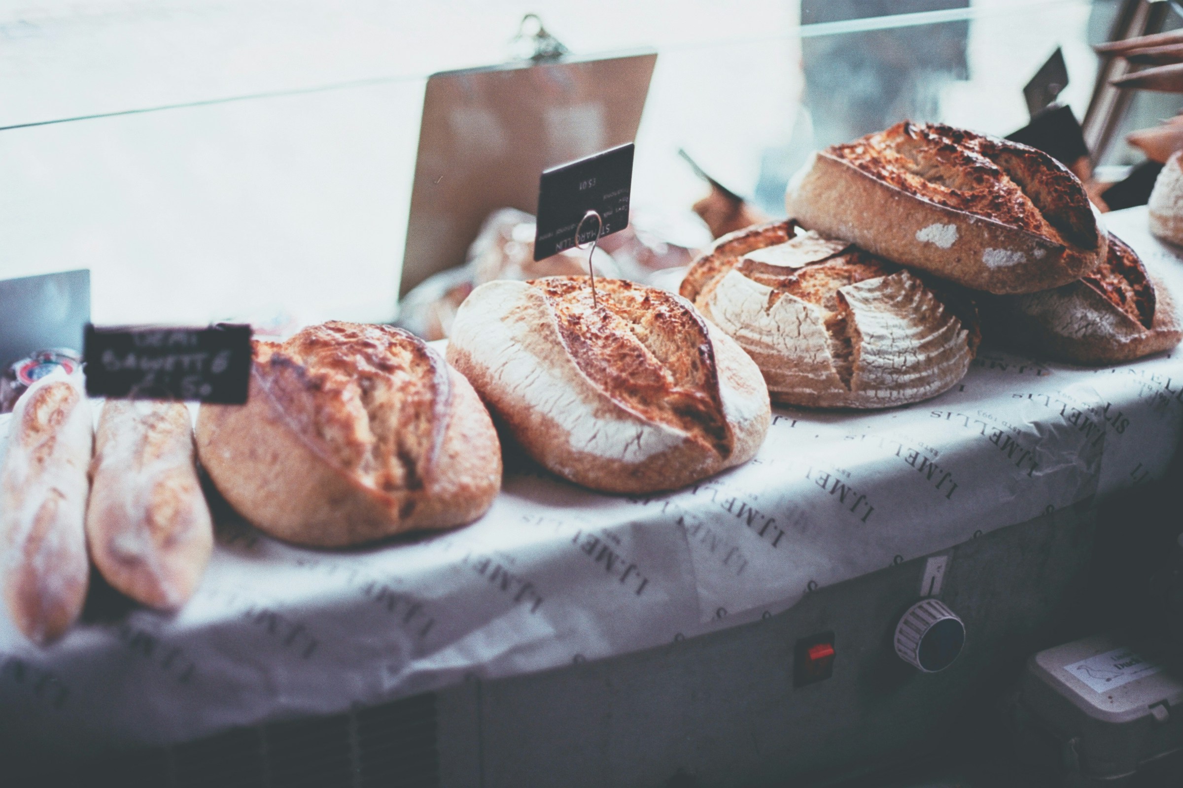 Loaves of bread in a store | Source: Unsplash