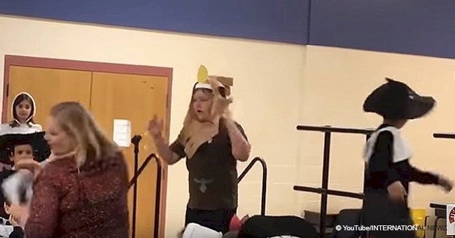 Boy with autism bursts out crying on stage when teacher snatches the microphone away