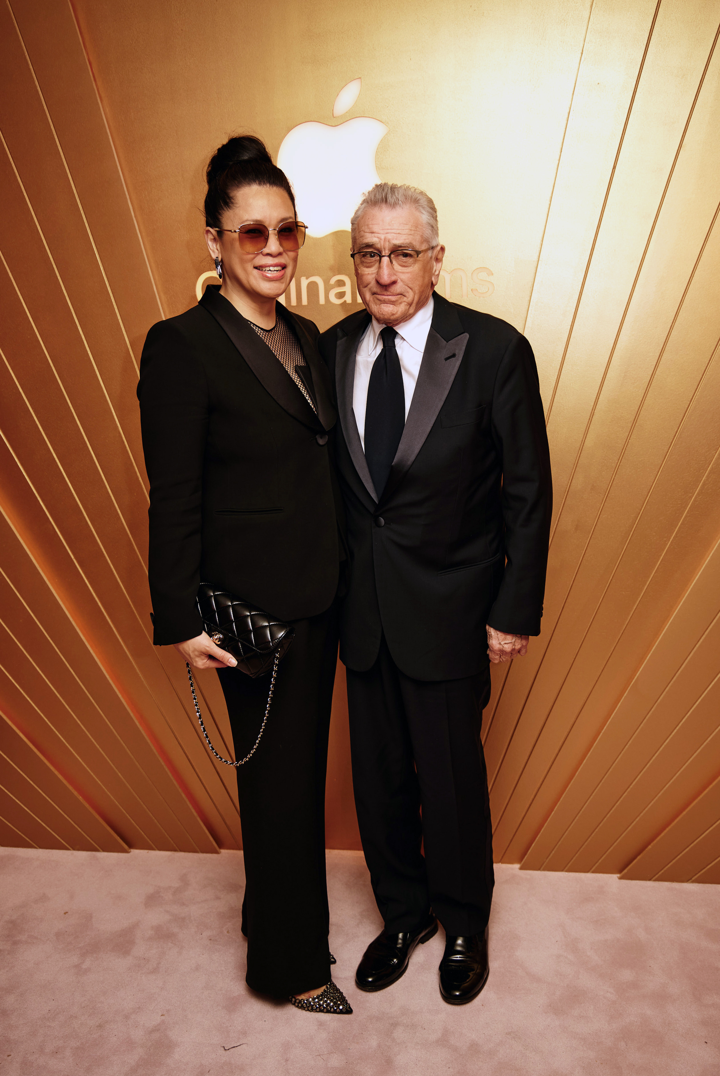 Tiffany Chen and Robert De Niro at the Apple Original Films Oscars celebration at the Sunset Tower Hotel on March 10, 2024 in Los Angeles, California | Source: Getty Images