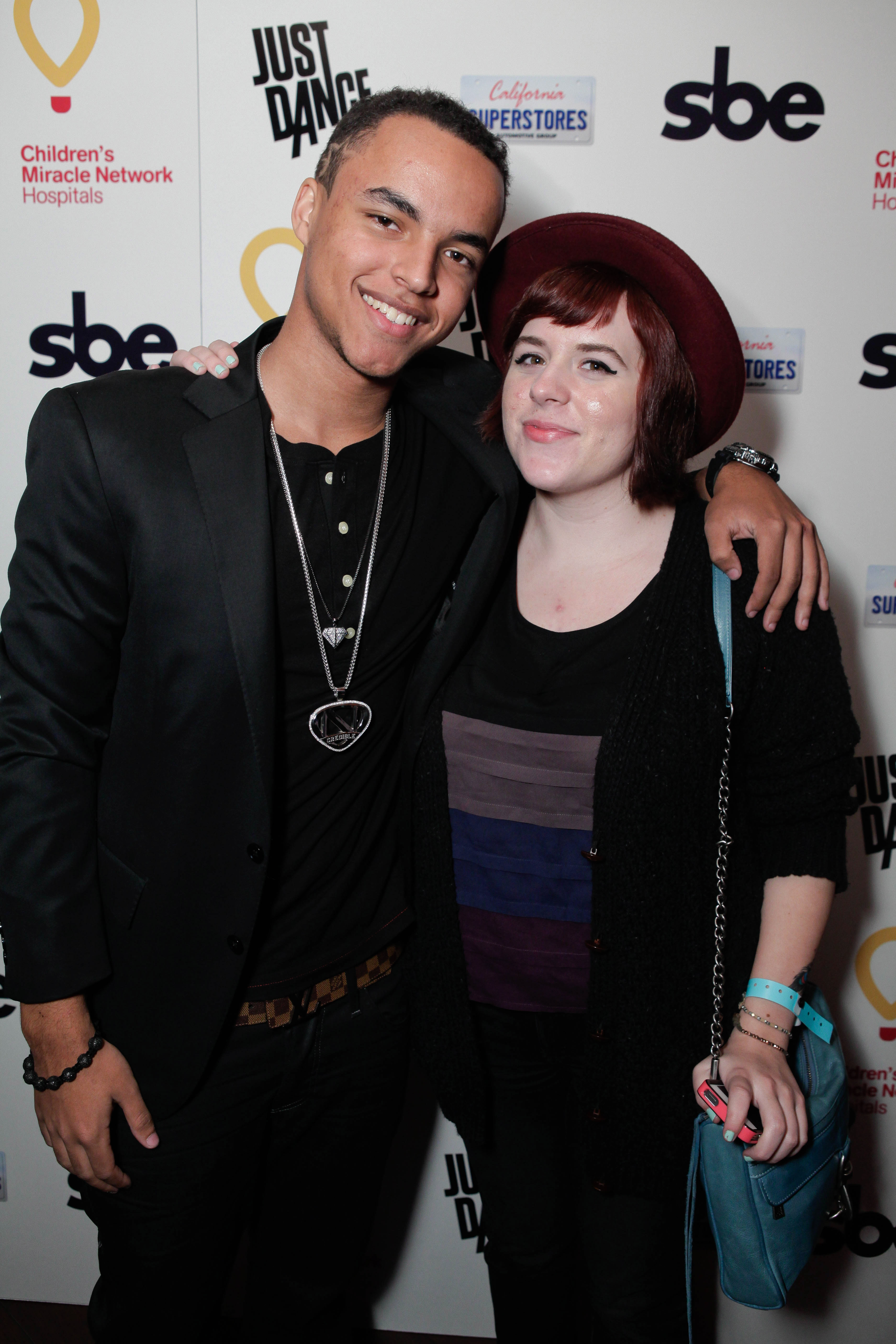 Connor and Bella Cruise at Connor's 17th birthday party benefiting Children's Miracle Network Hospitals in Los Angeles, California on January 18, 2012. | Source: Getty Images
