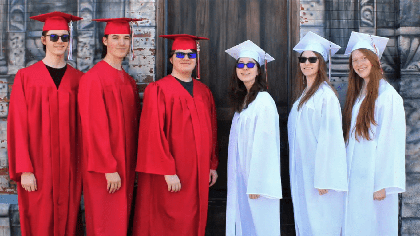 The Headrick sextuplets in their graduation gown |  Photo: facebook/wichitaeagle