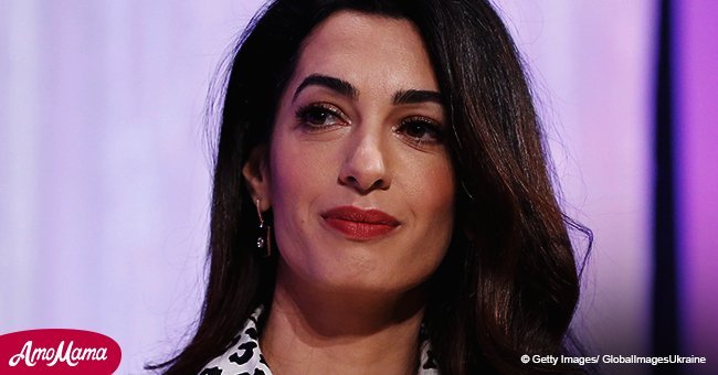 Amal Clooney bares scarily skinny waist in red corset as she steps out at recent public event