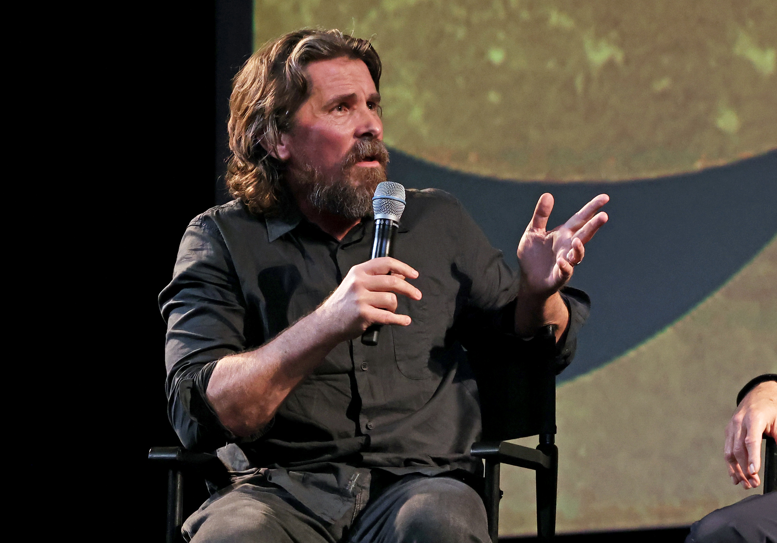 Christian Bale is pictured as he speaks onstage at the Amsterdam Los Angeles Special Screening at El Capitan Theatre on September 27, 2022, in Hollywood, California  | Source: Getty Images