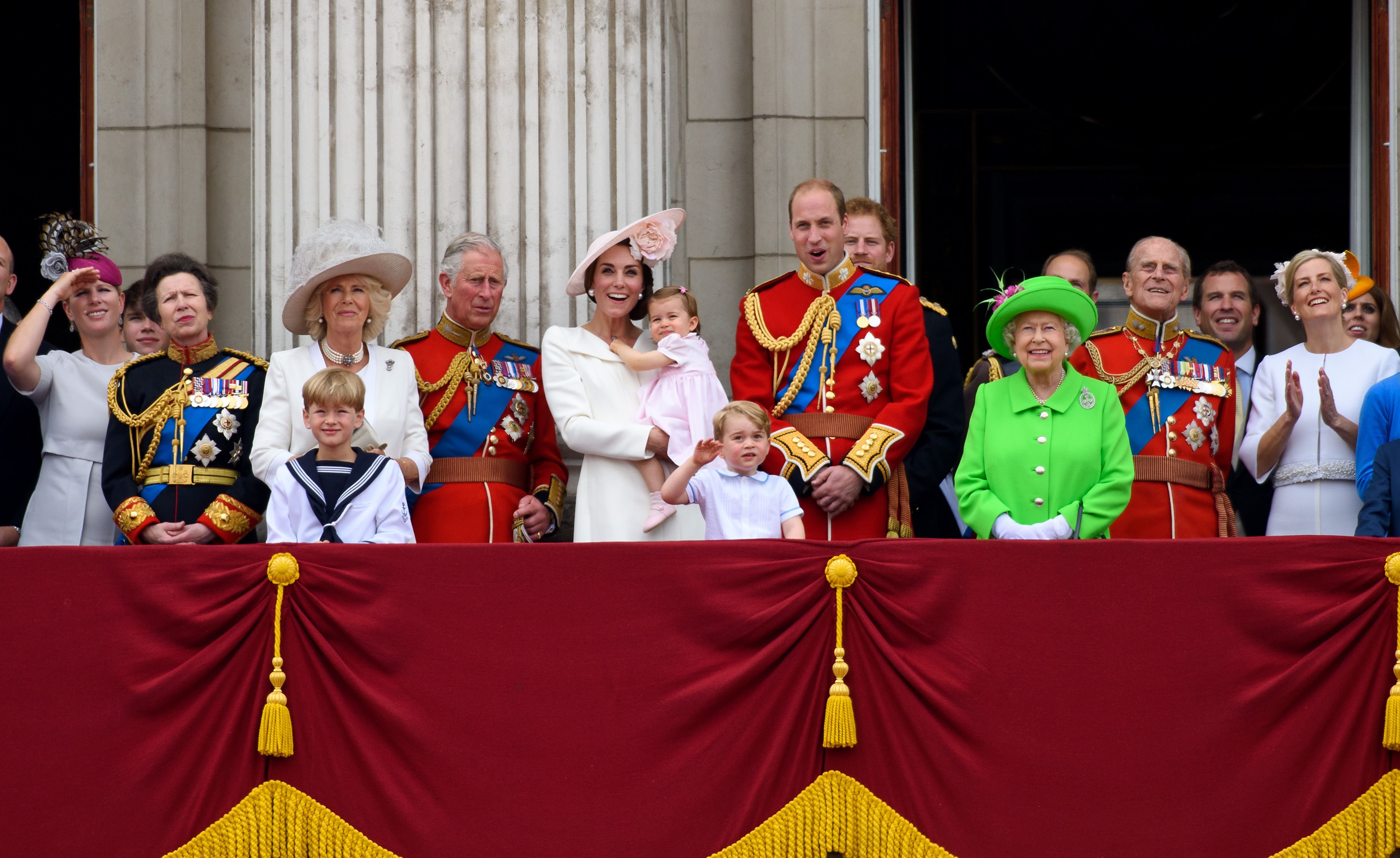 Some senior members of the royal family watch a plane fly past during the Trooping the Colour at The Mall on June 11, 2016 in London, England | Photo: Getty Images