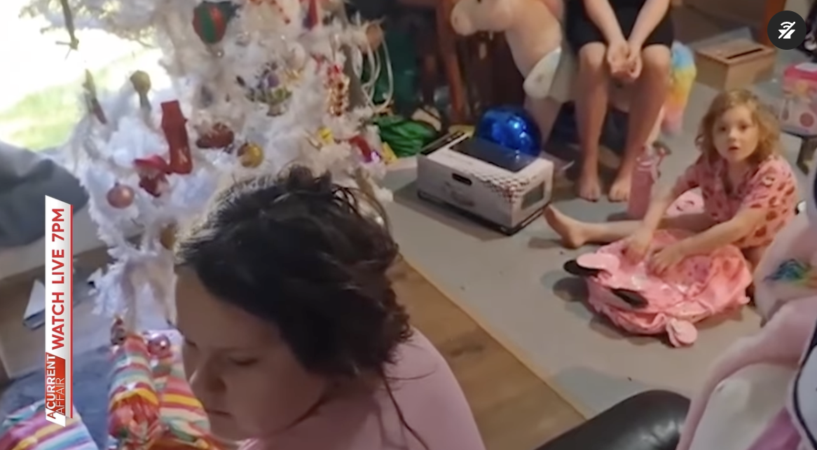 Kane and Ashley Stanik's children opening their presents on Christmas morning, as seen in a video dated January 8, 2024 | Source: Source: instagram.com/acurrentaffair9