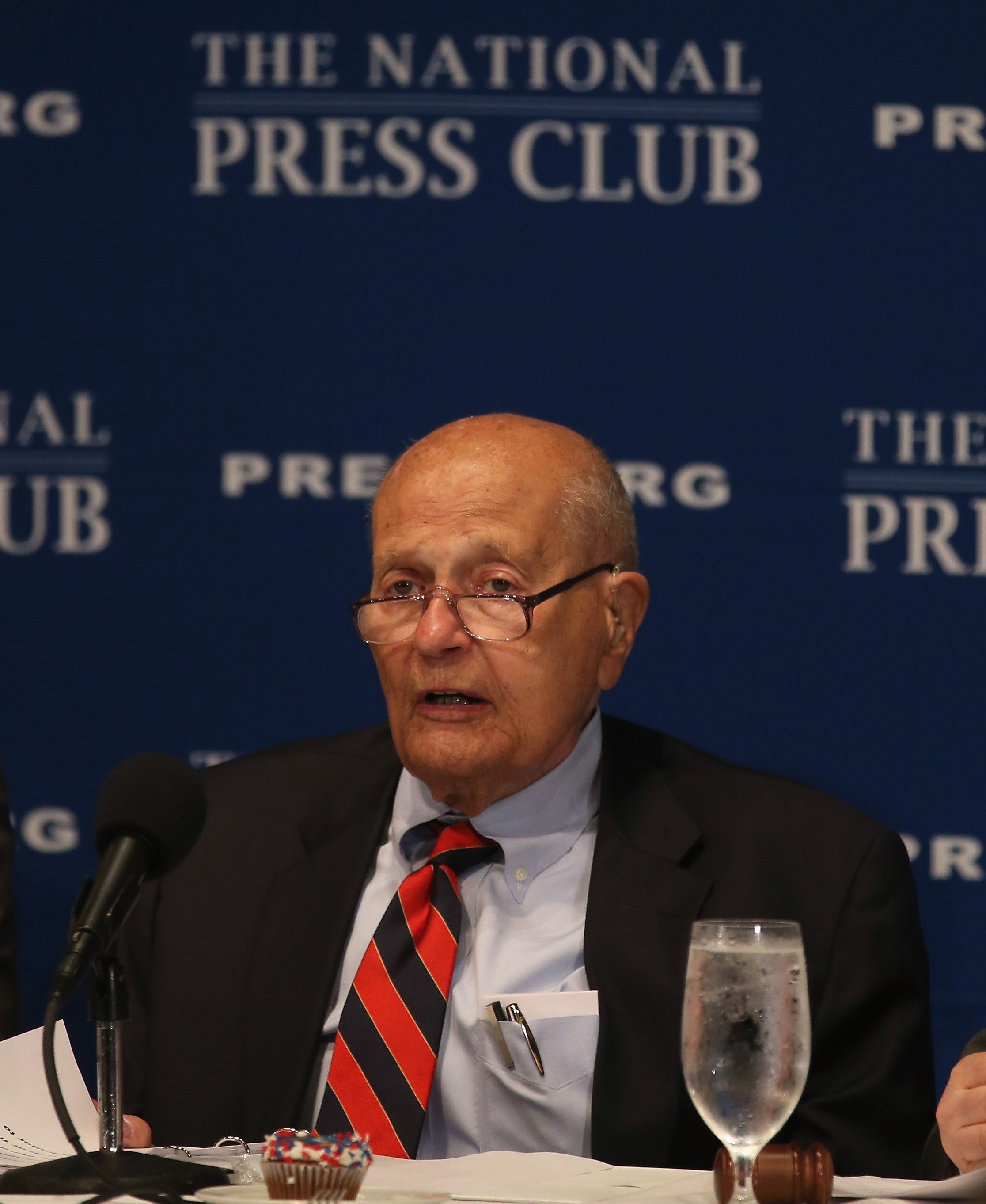 Rep. John Dingell delivering a speech at the National Press Club | Photo: Getty Images