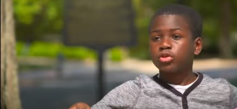 12-year-old genius Caleb Anderson, recruited by Georgia Tech, speaking to an interviewer | Photo: Youtube/ CBS This Morning 