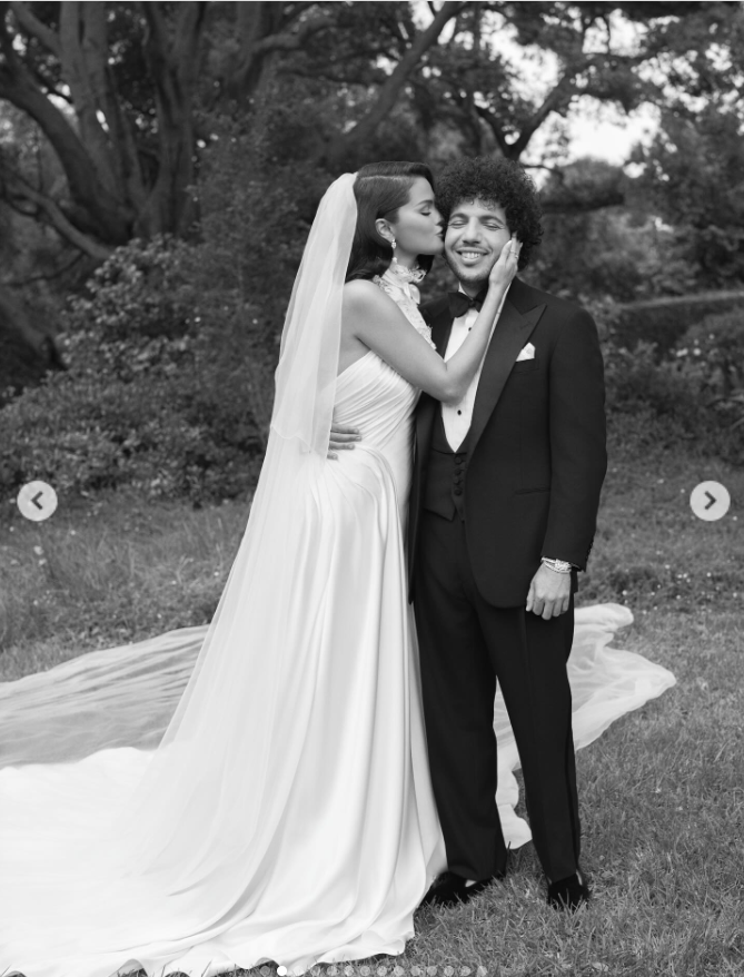Selena Gomez kisses her husband Benny Blanco on the cheek, from a post dated September 30, 2025 | Source: Instagram/selenagomez