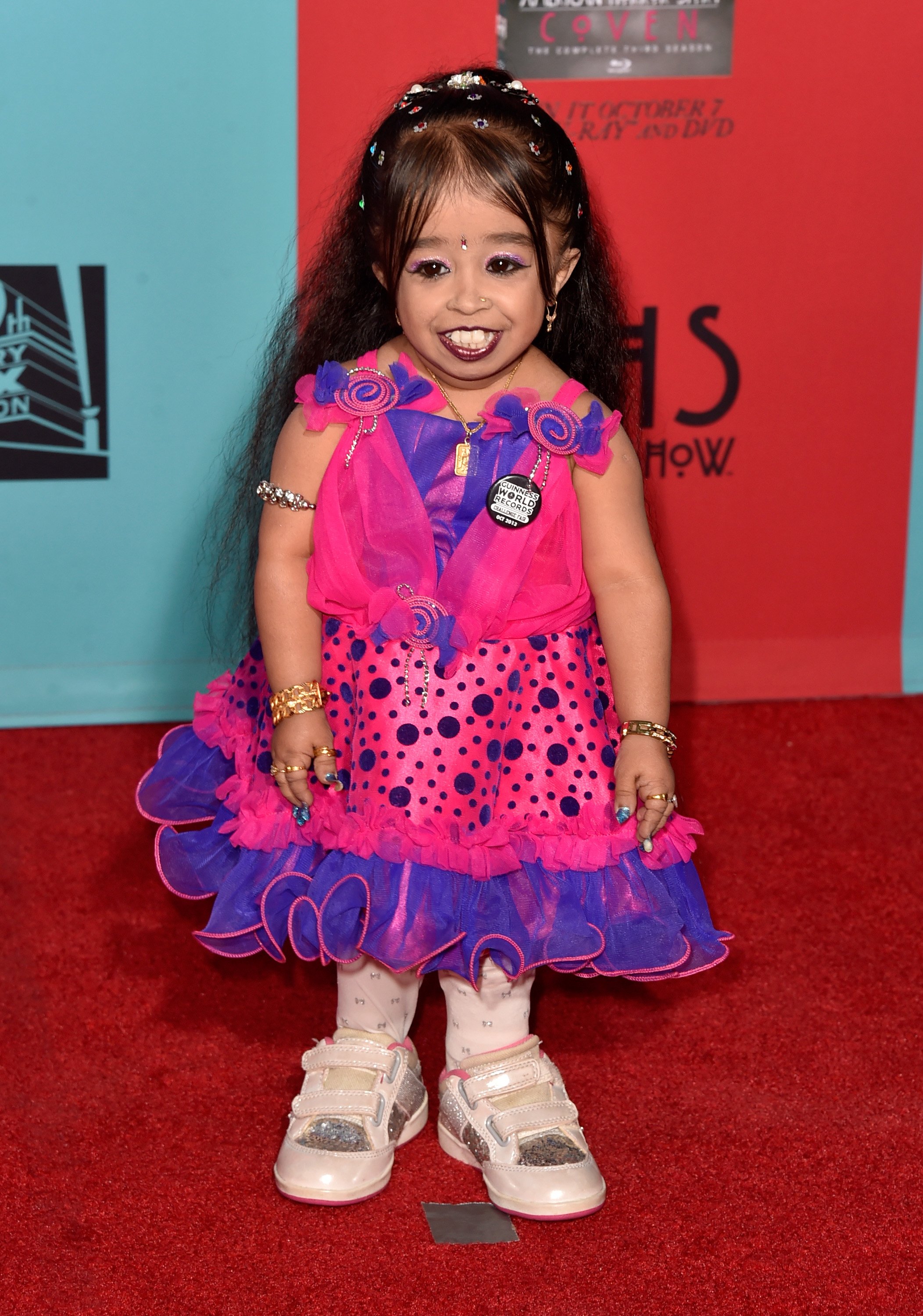 Actress Jyoti Amge attends the premiere screening of FX's "American Horror Story: Freak Show" at TCL Chinese Theatre on October 5, 2014 in Hollywood, California. | Source: Getty Images