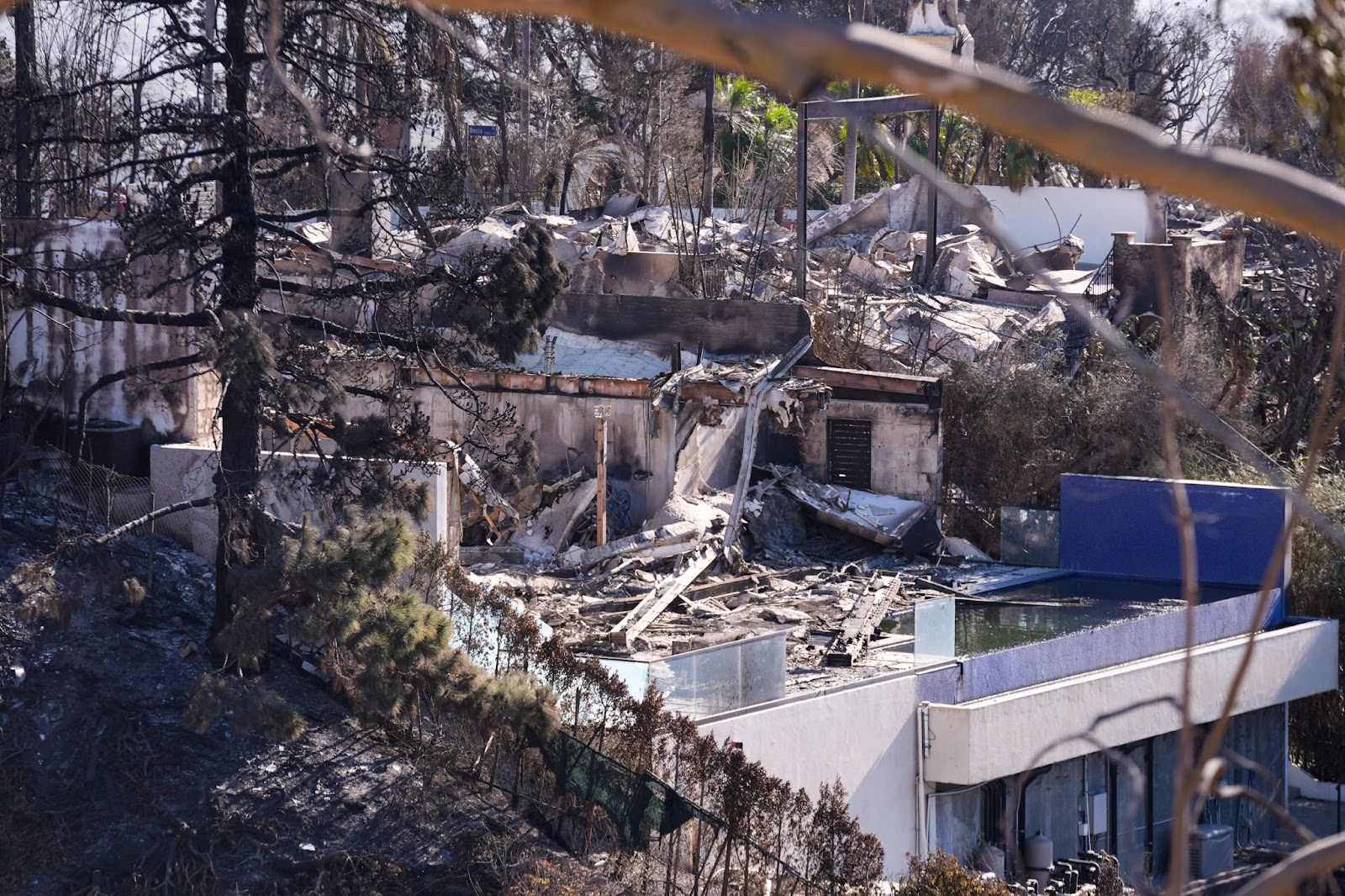 A view of a burned residential area in Los Angeles, California, on January 12, 2025. | Source: Getty Images