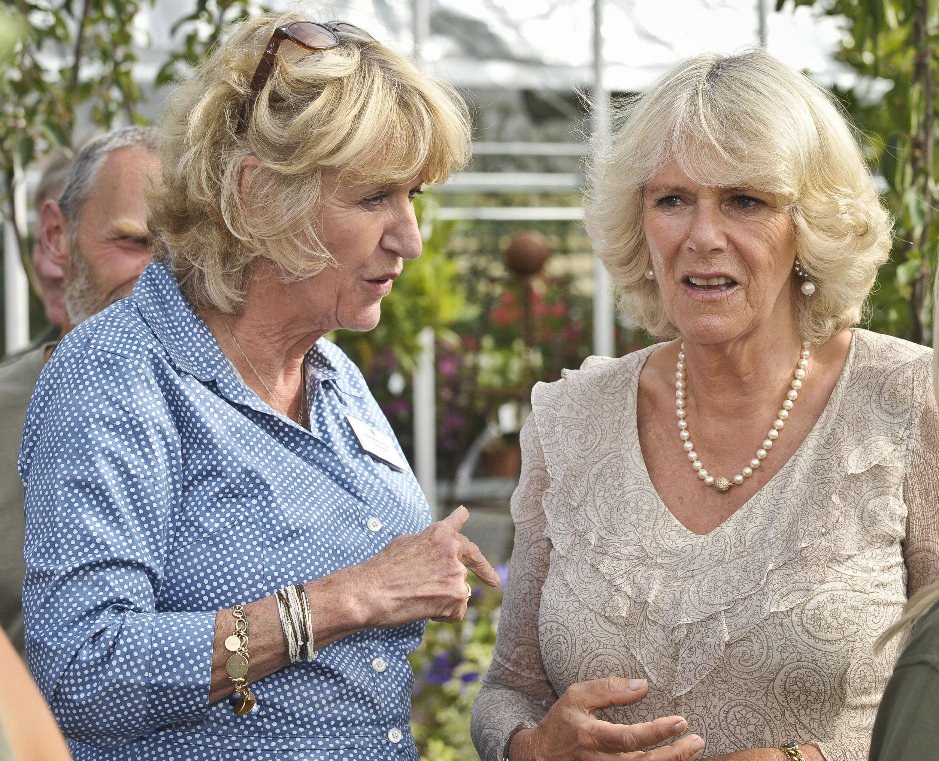 Annabel Elliot  chats with Queen Camilla as she and King Charles III open a new visitor's centre and cafe at the Duchy Nursery in Lostwithiel, Cornwall, on July 12, 2011 | Source: Getty Images