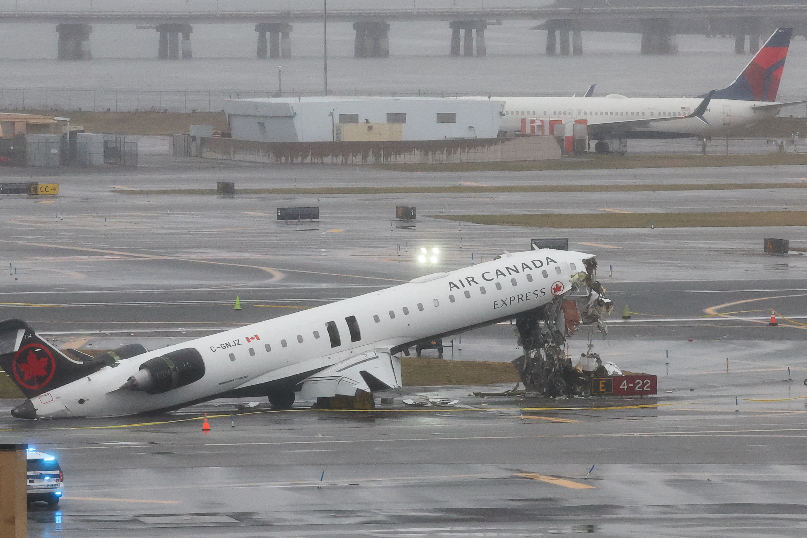 An Air Canada Express CRJ-900 sits on the runway after colliding with a Port Authority fire truck at LaGuardia Airport in New York, on March 23, 2026 | Source: Getty Images