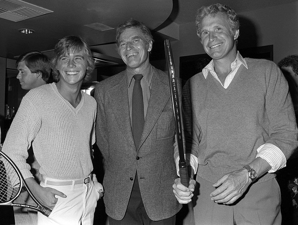  Actors Christopher Atkins, Charlton Heston and Wayne Rogers at a party honoring Heston as the host of a tennis tournament benefiting the American Film Institute, on June 17, 1982 | Photo: Getty Images