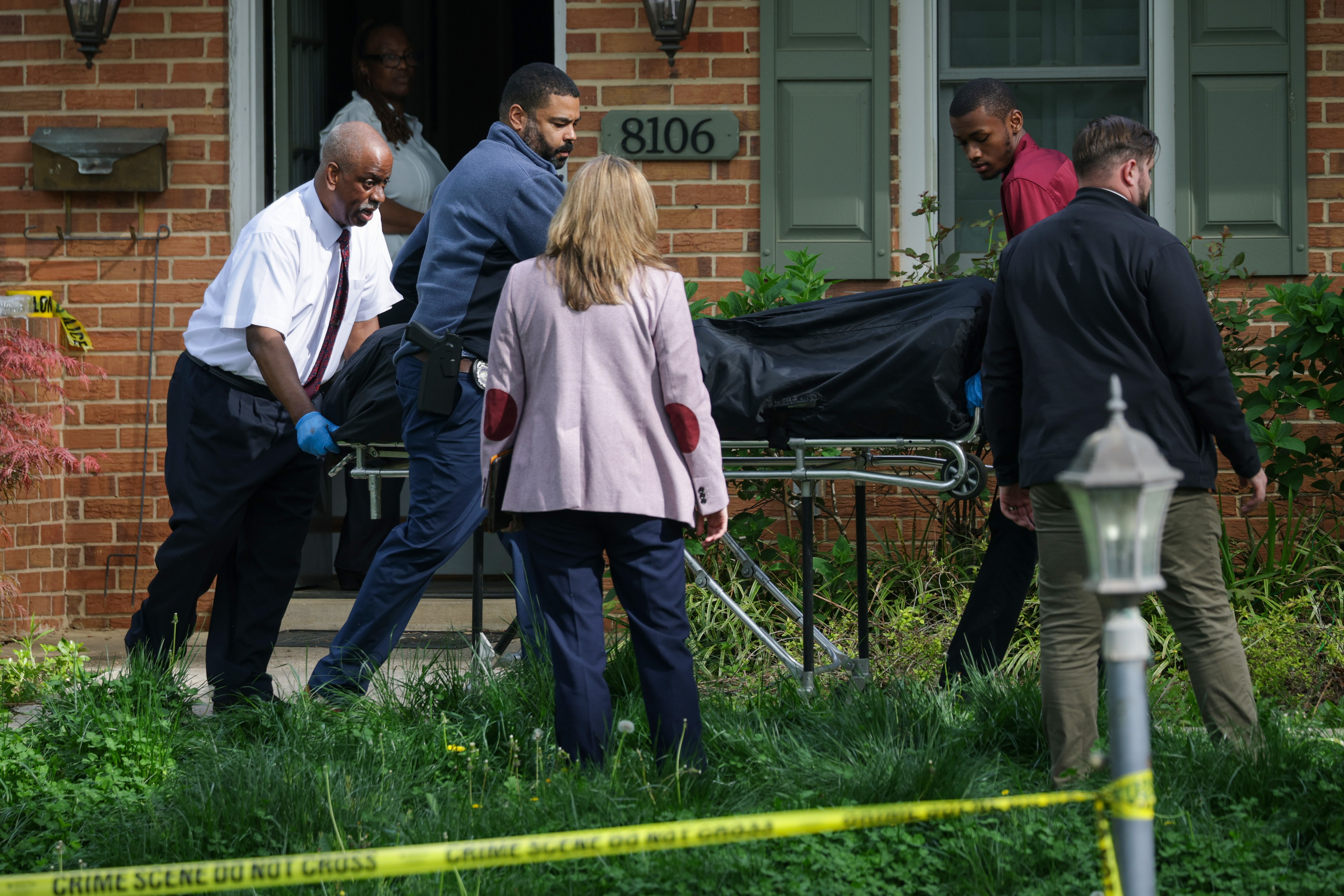 Body is removed on a gurney from a crime scene outside the home of former Virginia Lt Gov Justin Fairfax on April 16, 2026 in Annandale, Virginia | Source: Getty Images