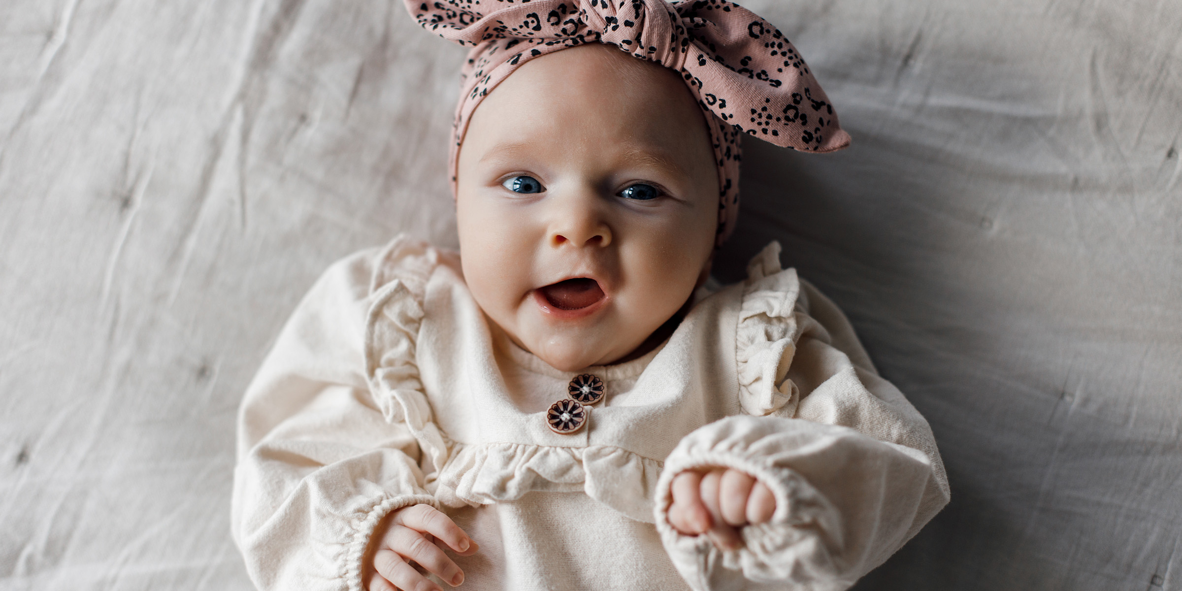 A happy baby girl | Source: Freepik