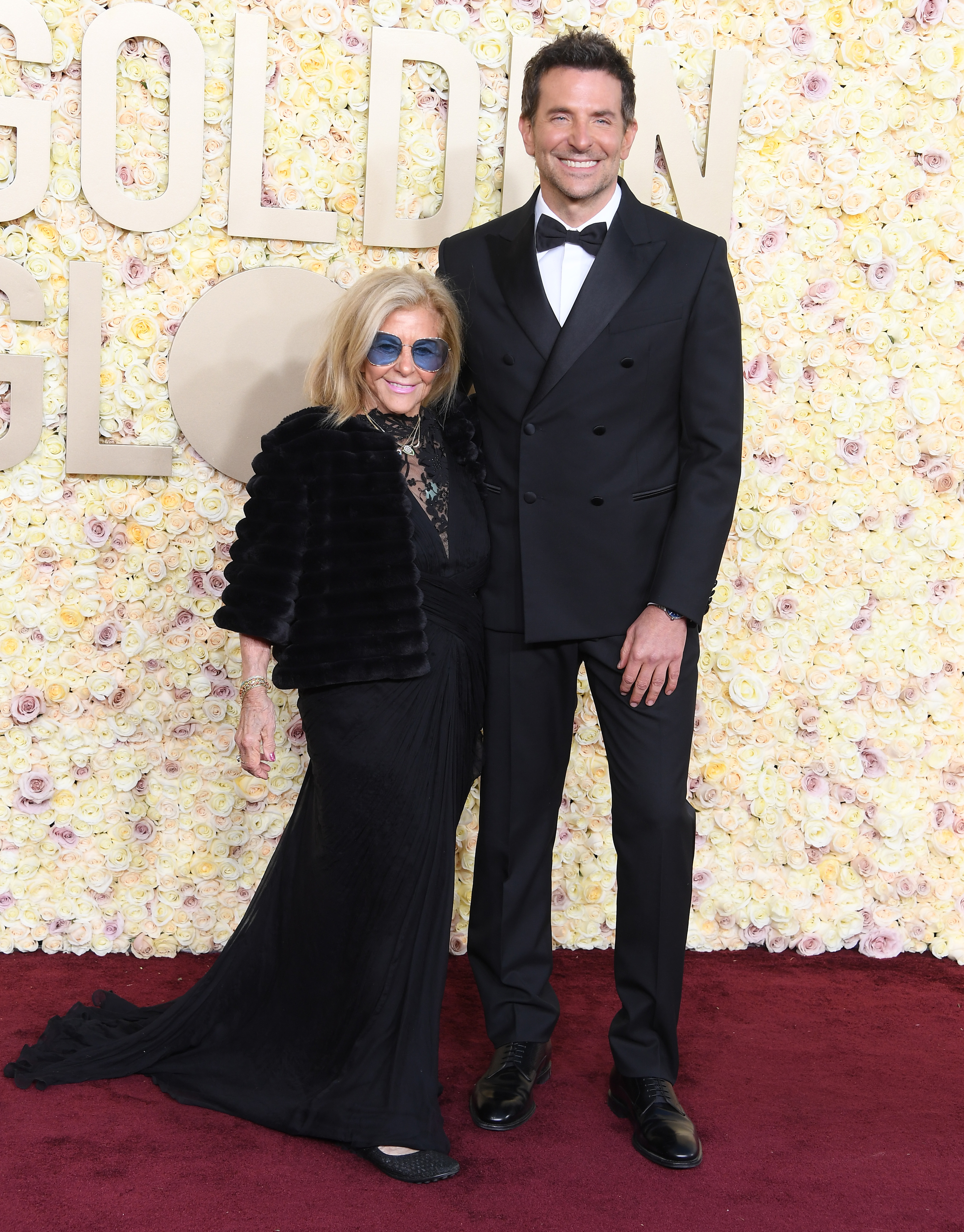 Gloria Campano and Bradley Cooper at the 81st Annual Golden Globe Awards in Beverly Hills, California on January 07, 2024 | Source: Getty Images