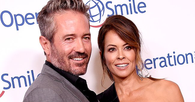 A portrait of Brooke Burke and Scott Rigsby | Photo: Getty Images