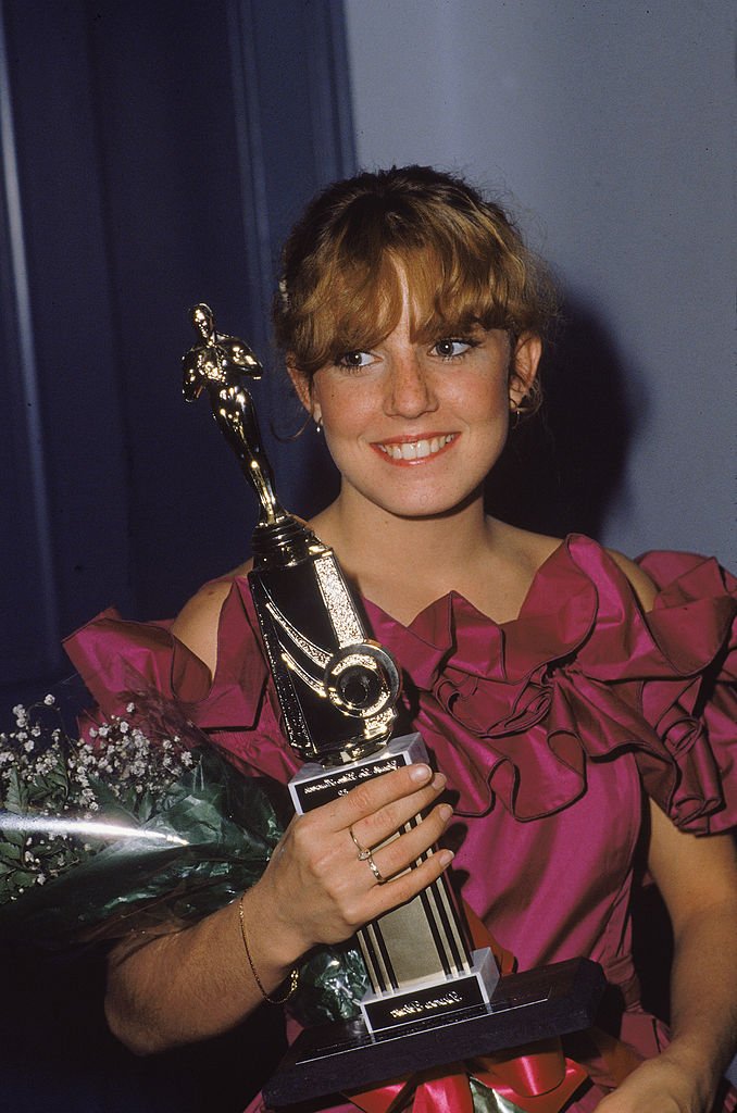 Dana Plato holds her 'Youth in Film' award in the early 1980s | Photo: Getty Images