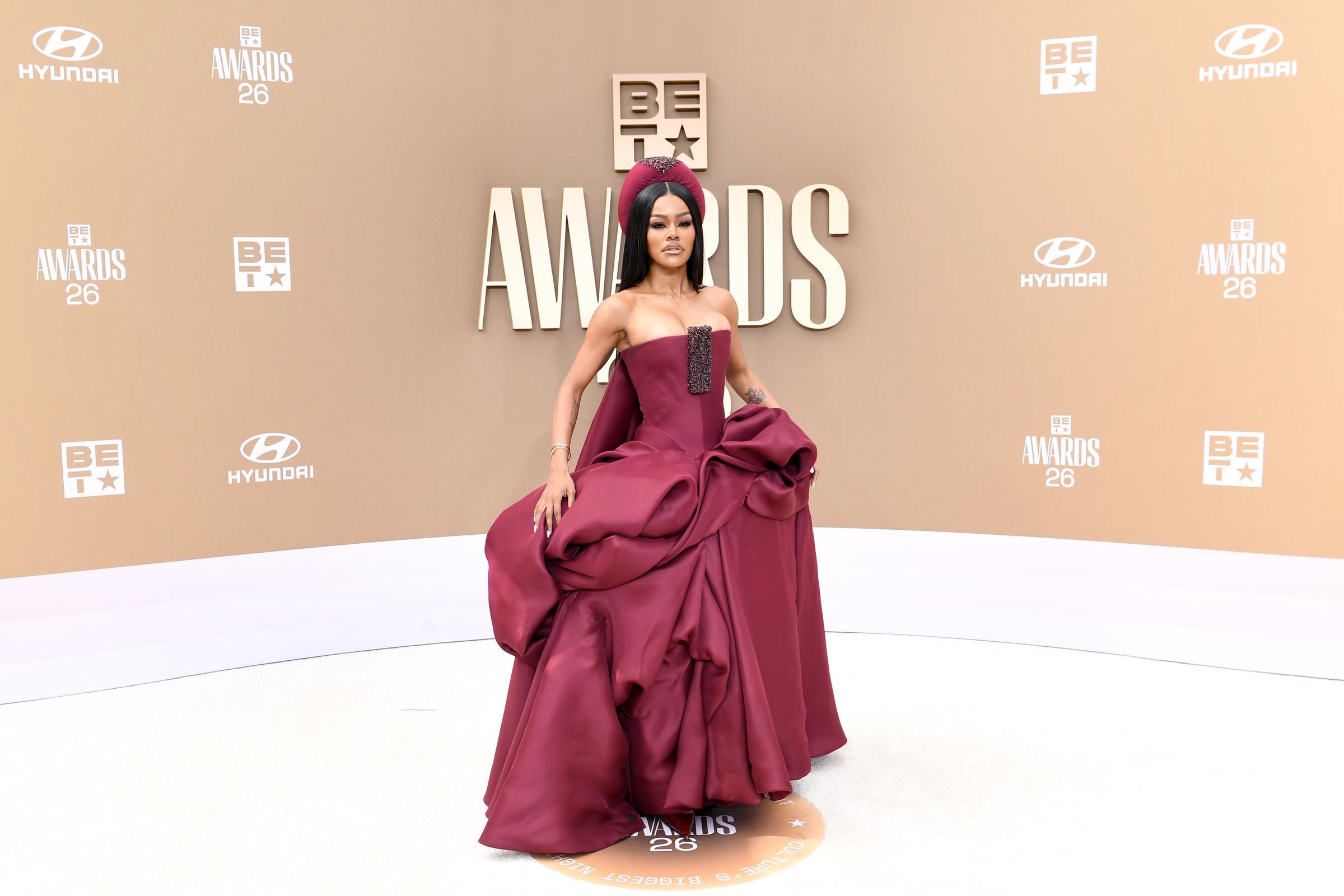 This full-body photo shows the complete outfit that sparked so much discussion online. Some fans called it one of the best looks of the night, while others felt it was too dramatic for the BET Awards. | Source: Getty Images
