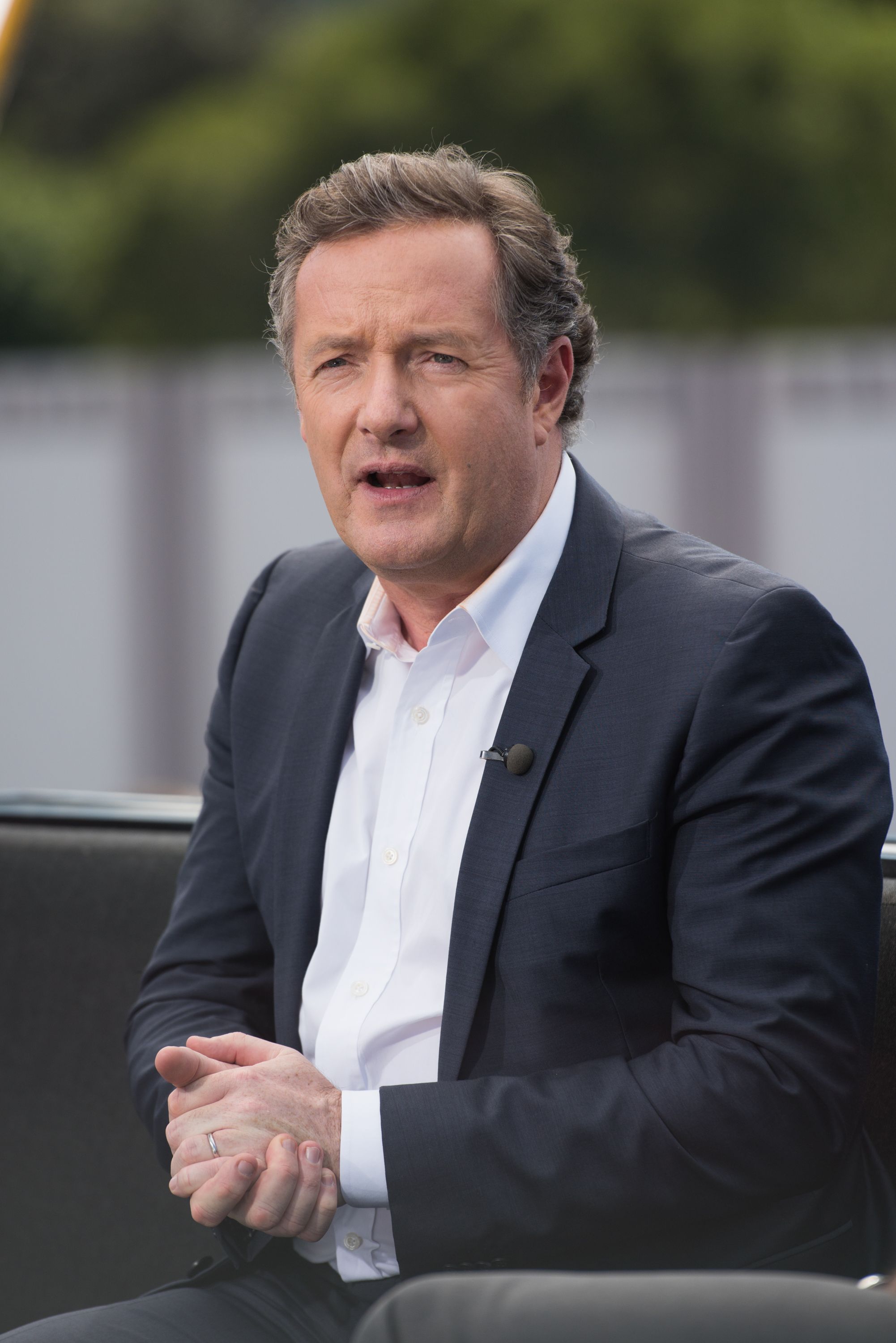 Piers Morgan visits "Extra" at Universal Studios Hollywood on February 11, 2016 | Getty Images 