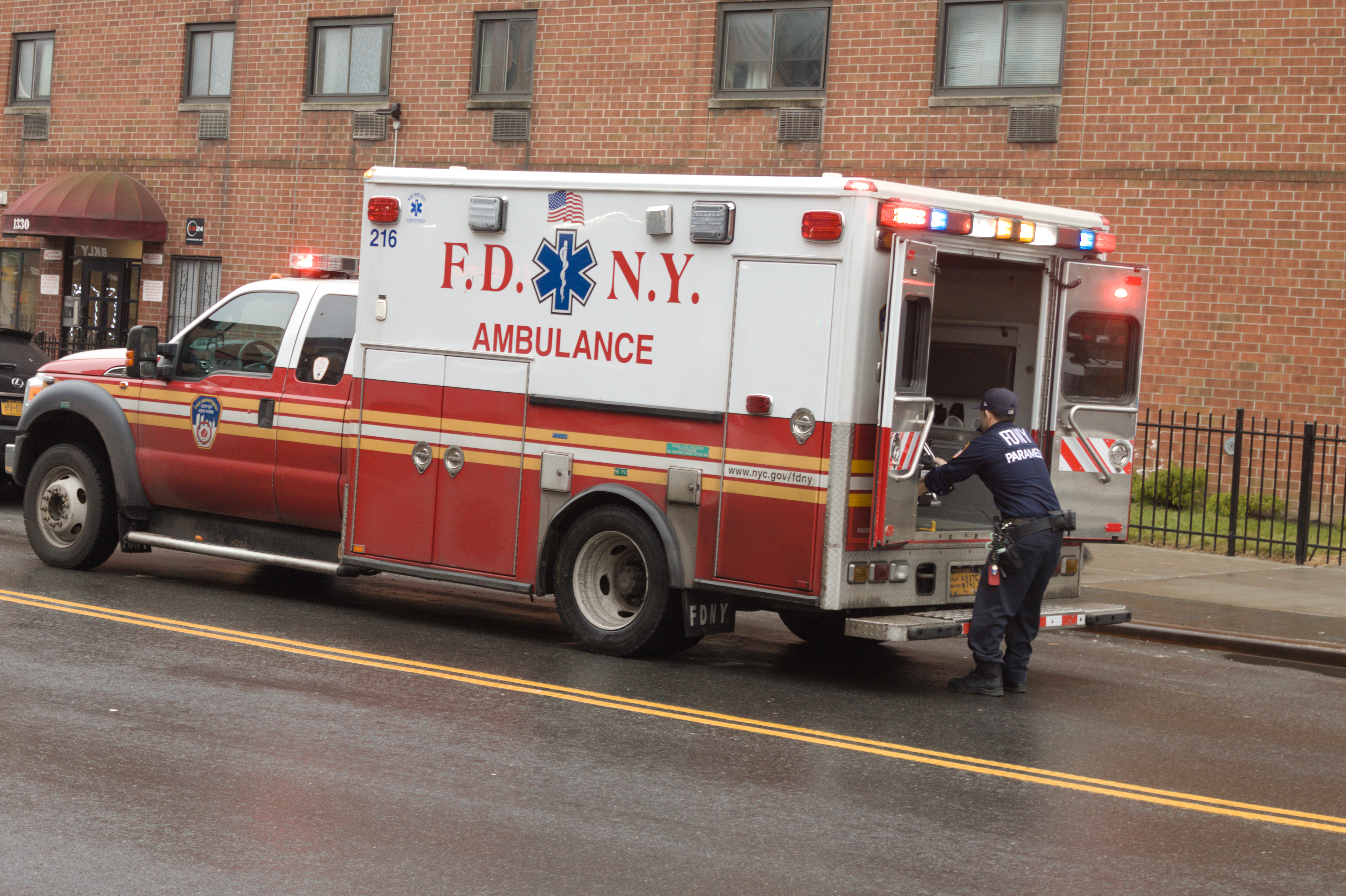 A paramedic and ambulance. | Source: Shutterstock
