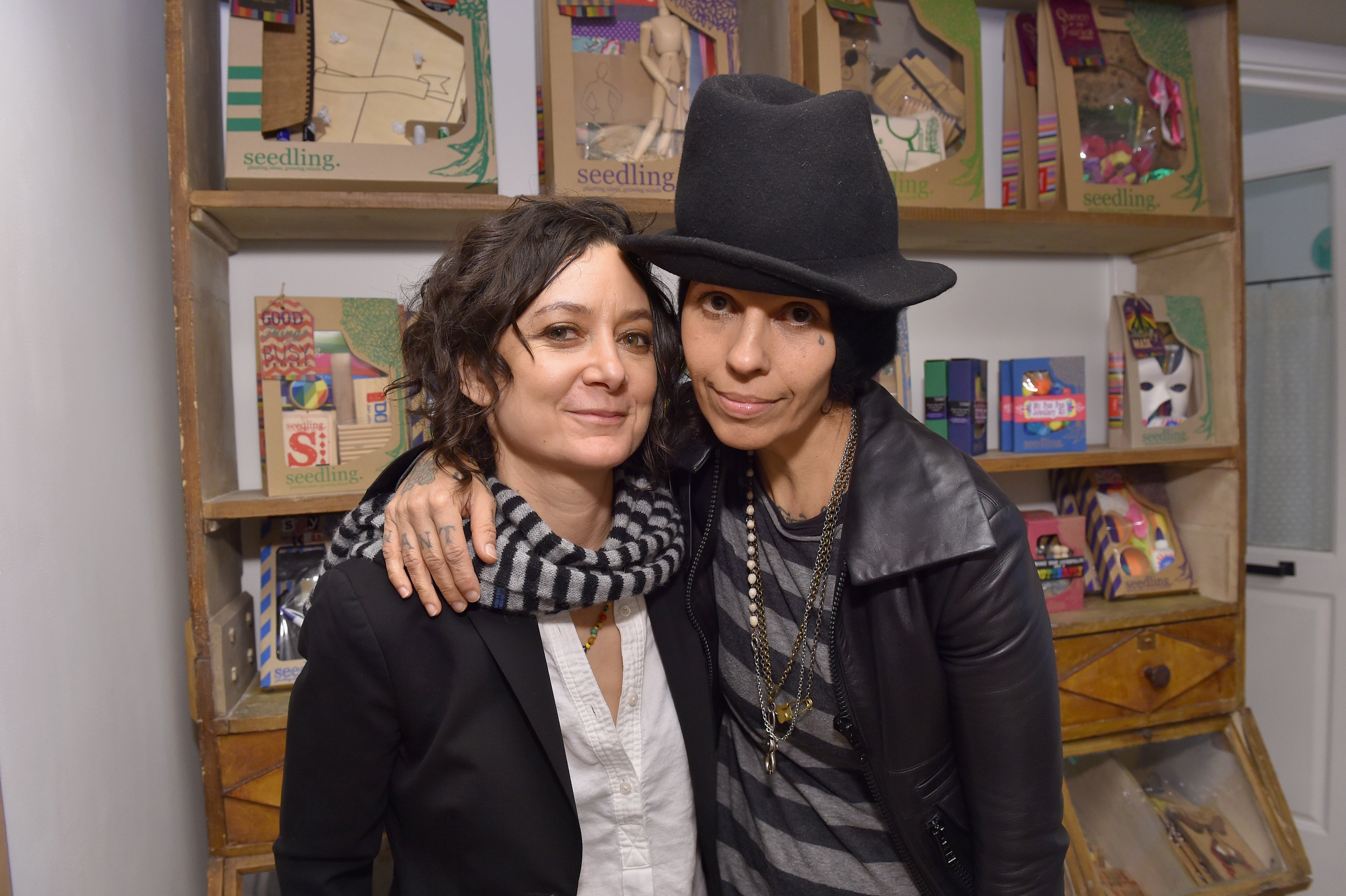Sara Gilbert and singer Linda Perry attend the Grand Opening Of Au Fudge, Presented By Amazon Family on March 1, 2016, in West Hollywood, California. | Source: Getty Images.