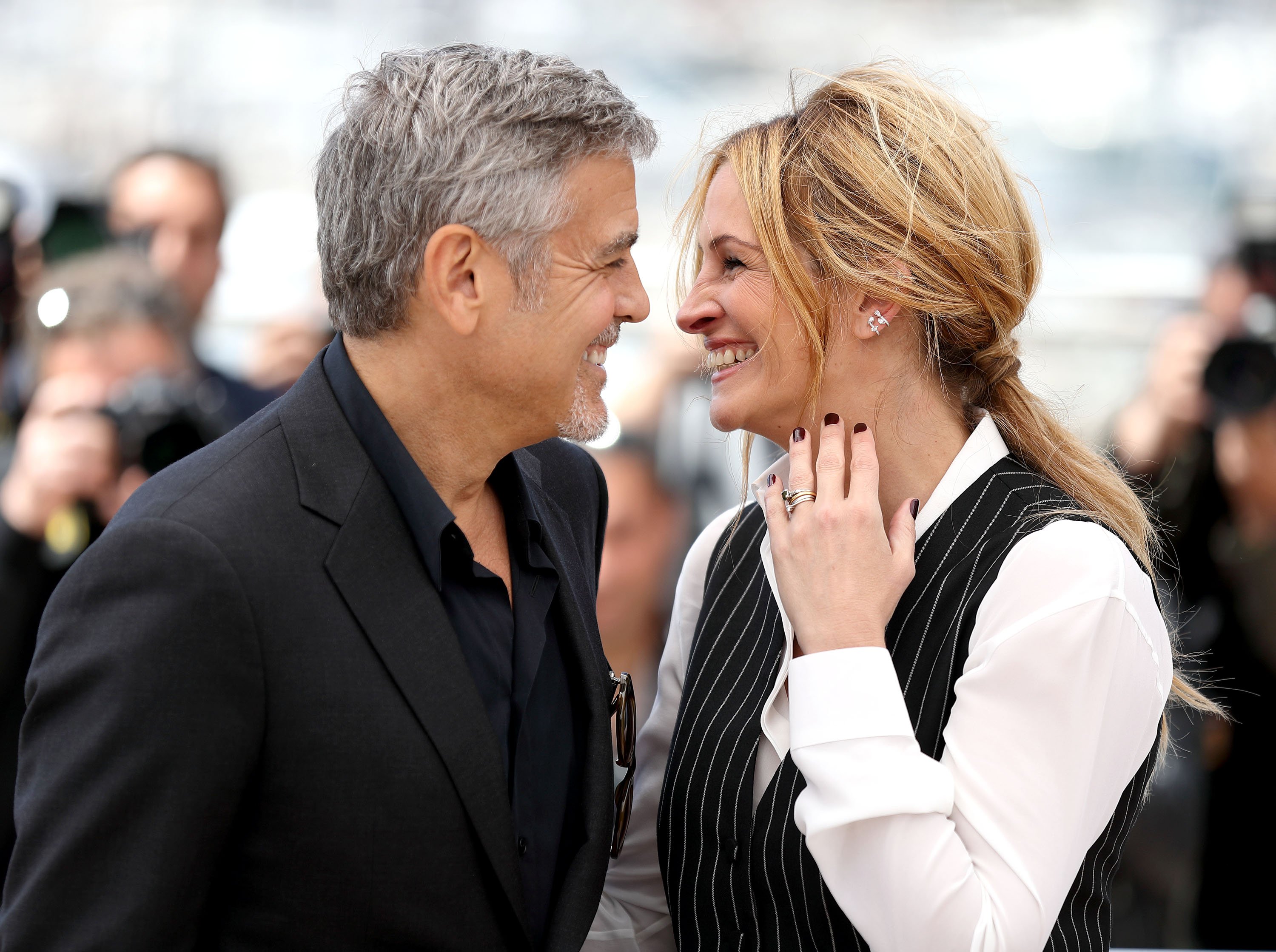 George Clooney and Julia Roberts attend the 'Money Monster' photocall during the 69th annual Cannes Film Festival at the Palais des Festivals on May 12, 2016 in Cannes, France. | Source: Getty Images