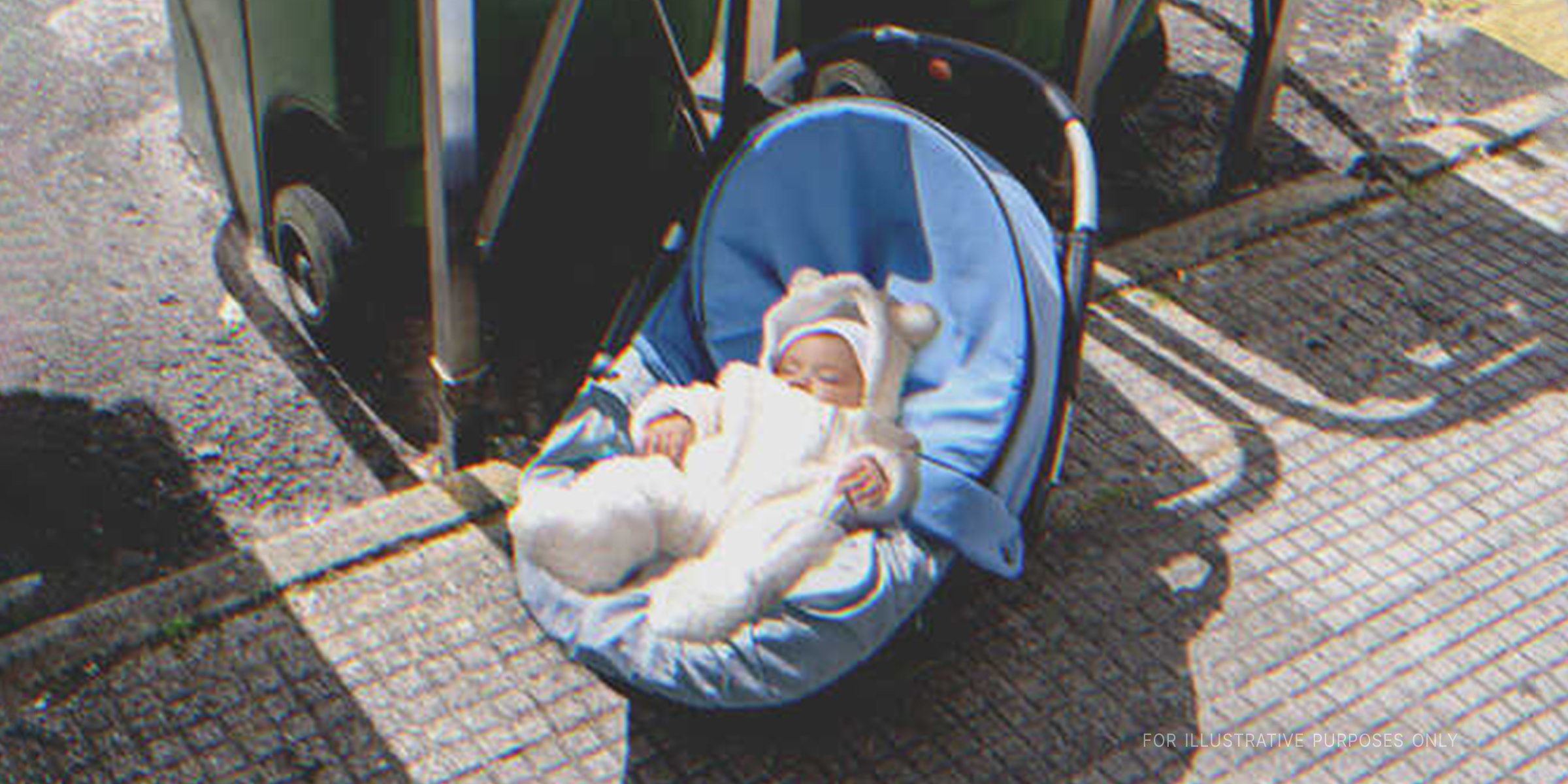 Baby in a car seat near a dumpster | Source: Shutterstock