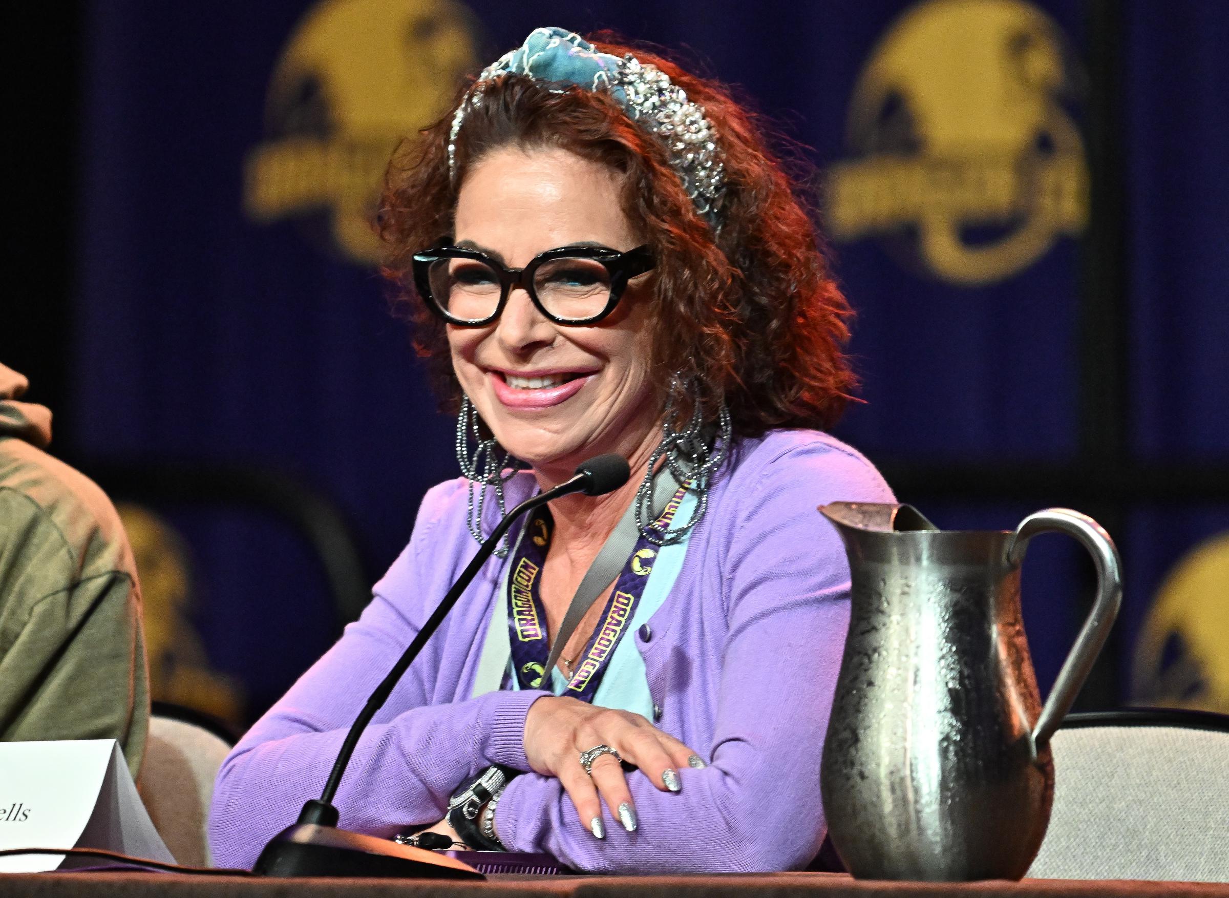 Claudia Wells speaks during the "Back to the Future 40th Anniversary!" panel at DragonCon in Atlanta, Georgia, on August 29, 2025 | Source: Getty Images
