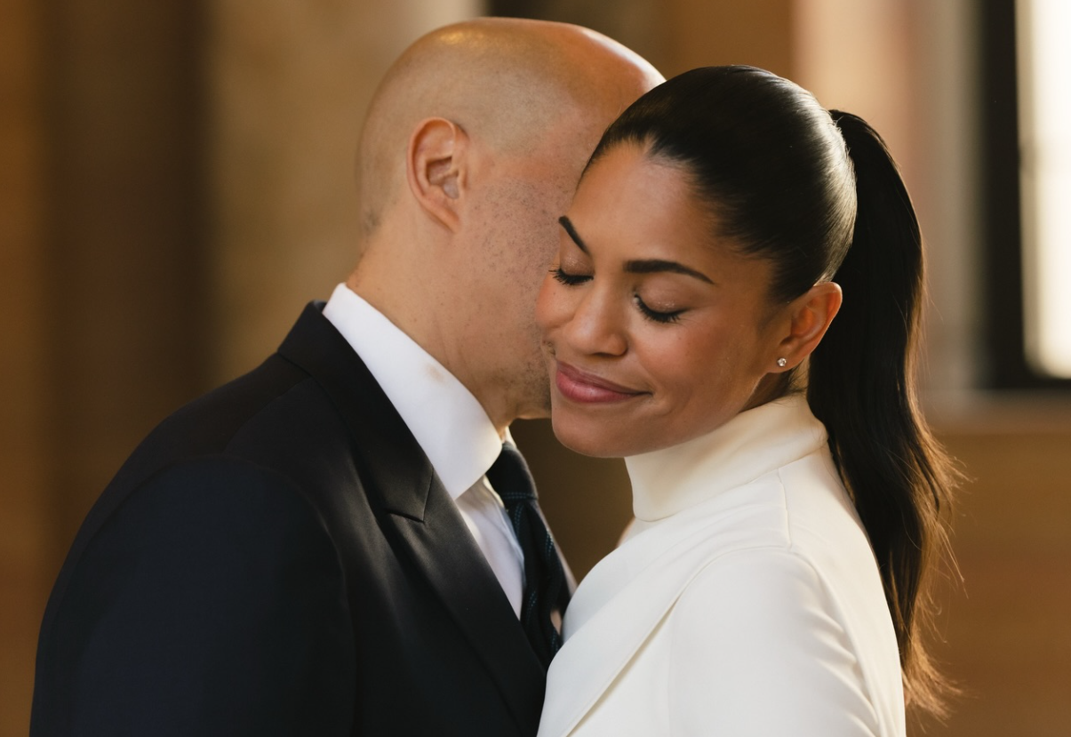 Cory Booker and Alexis Lewis post after their wedding, as seen from a post dated November 30, 2025. | Source: Facebook/CoryBooker