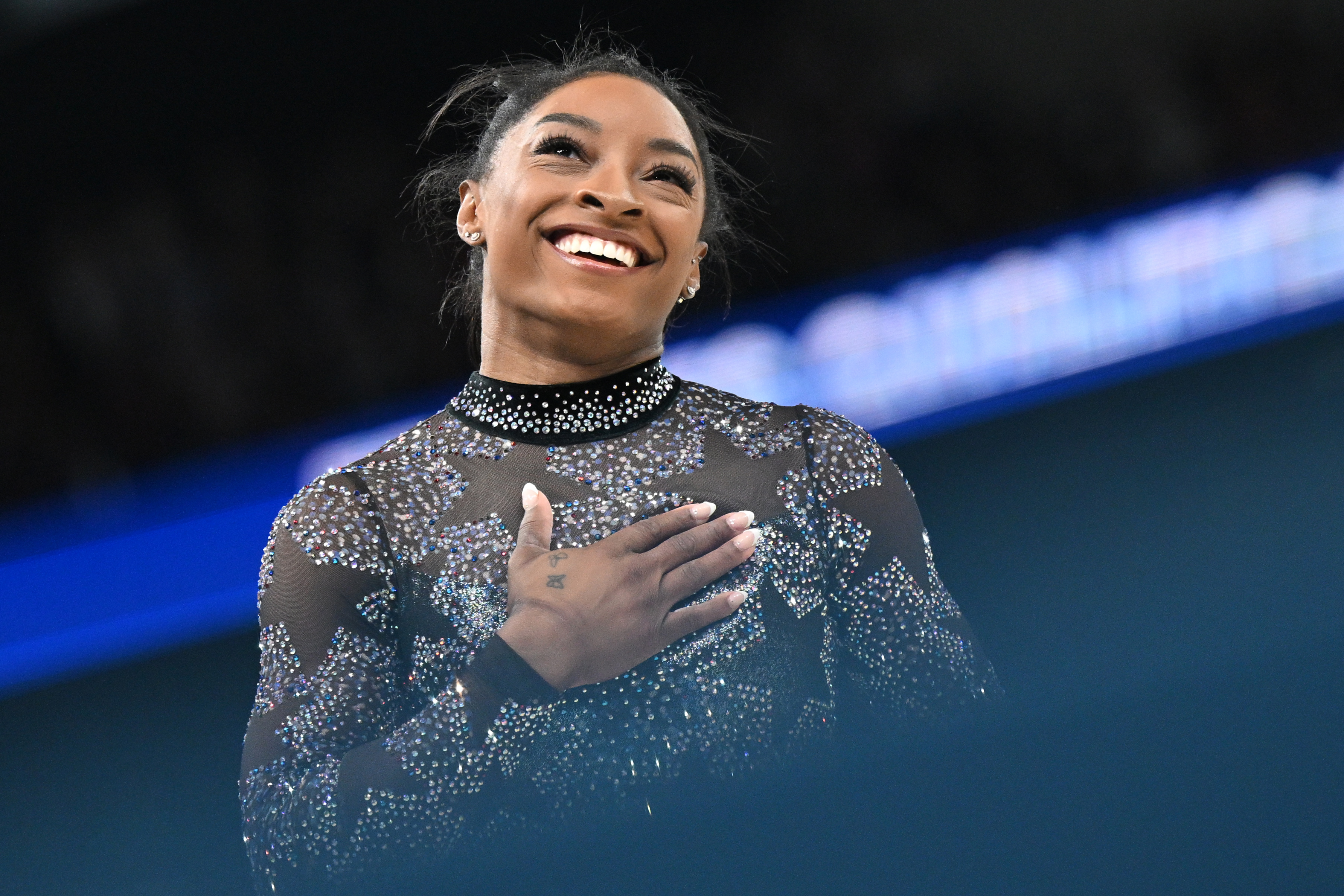 Simone Biles reacts during the gymnastics all-around qualification on the balance beam at the Paris 2024 Olympics on July 28, 2024 | Source: Getty Images