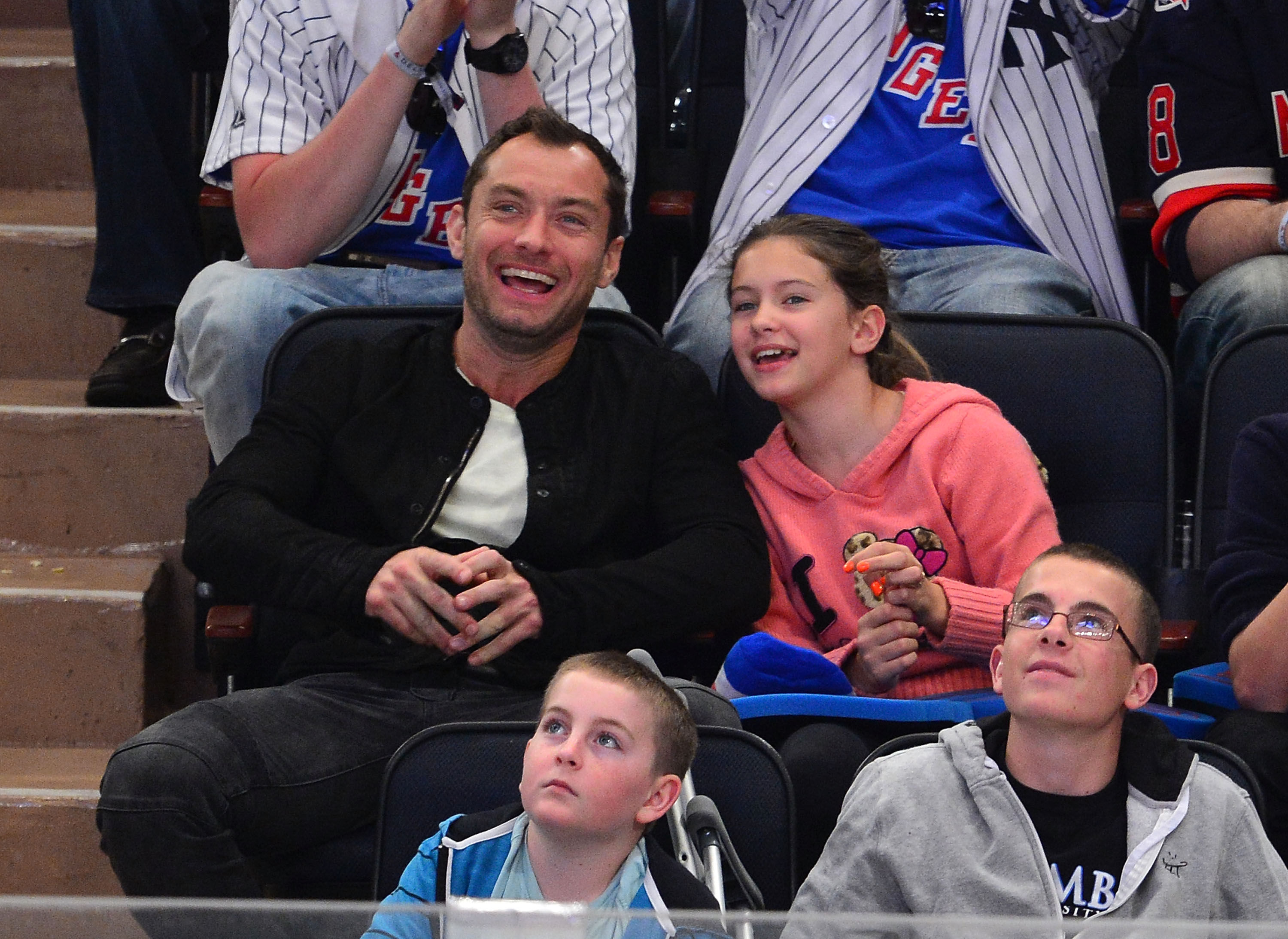 Jude Law and Iris Law attend the Ottawa Senators vs New York Rangers game on April 14, 2012 | Source: Getty Images