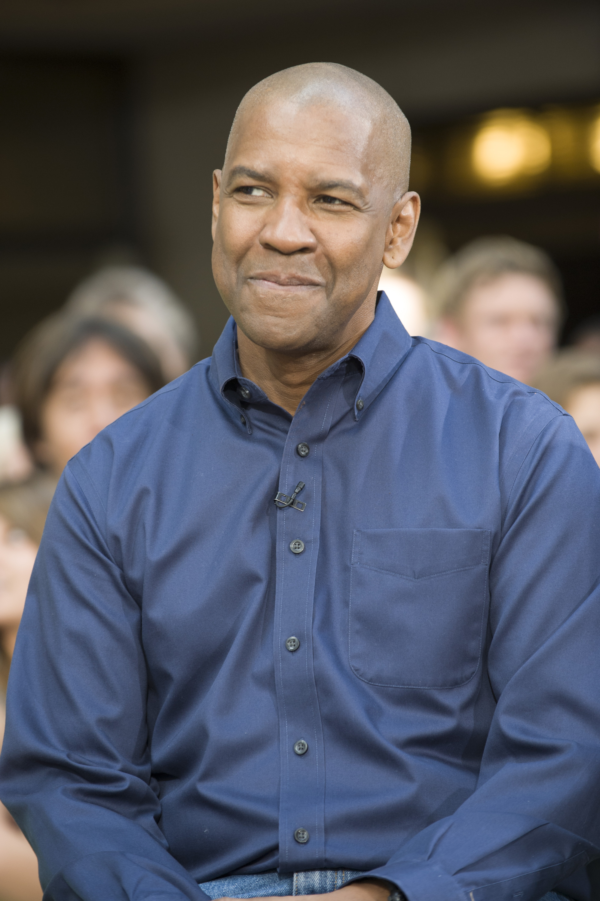On the "Today" show, Denzel Washington shows off a clean-shaven head and neatly groomed appearance. Wearing a blue button-down, his cut marks a bold departure from his signature styles of the past.