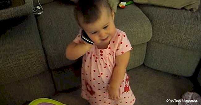 Baby makes her mother cry from laughter after speaking to her father on the phone