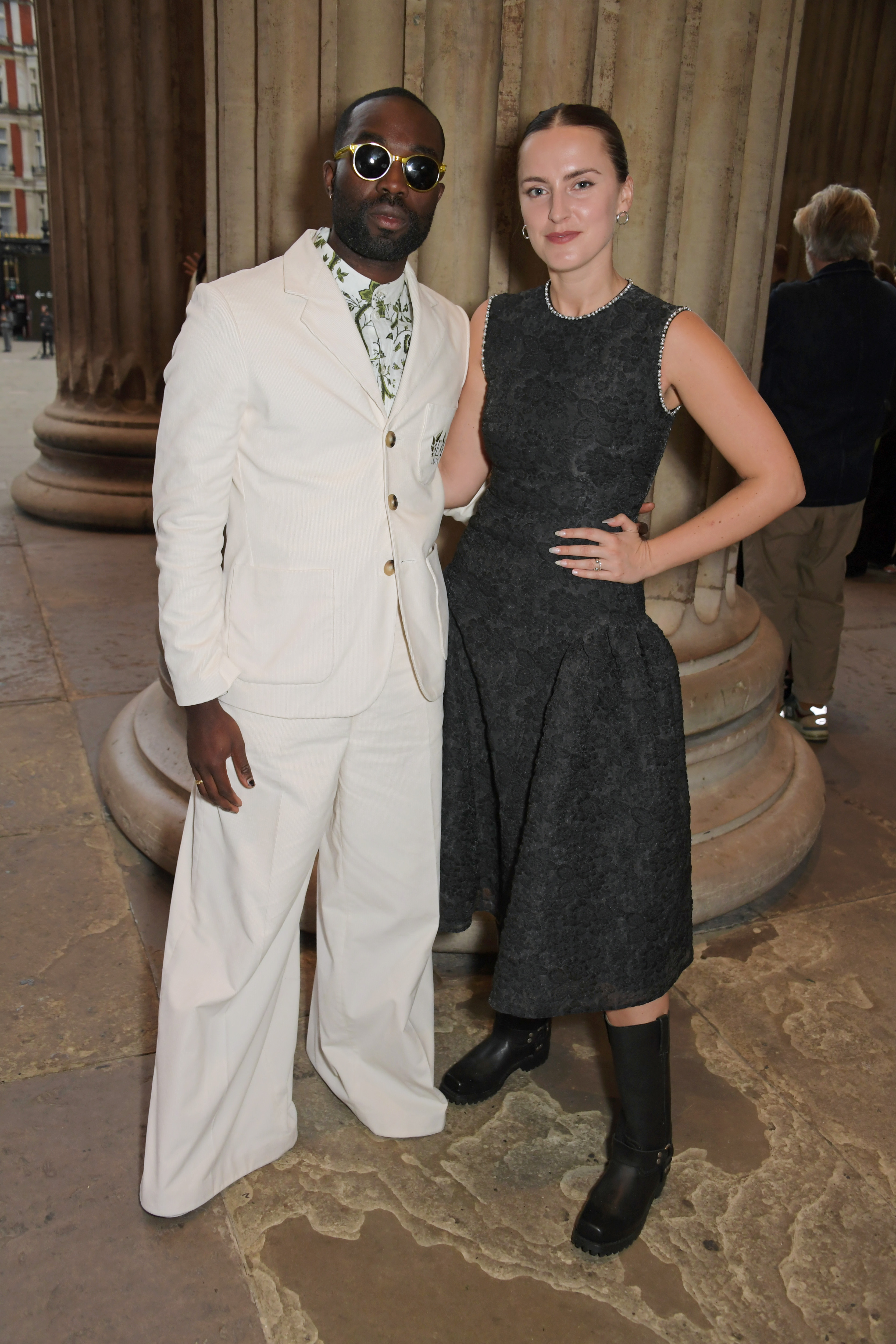 Paapa Essiedu and Rosa Robson pose at the ERDEM show during London Fashion Week September 2022 at The British Museum on September 18, 2022, in London, England | Source: Getty Images